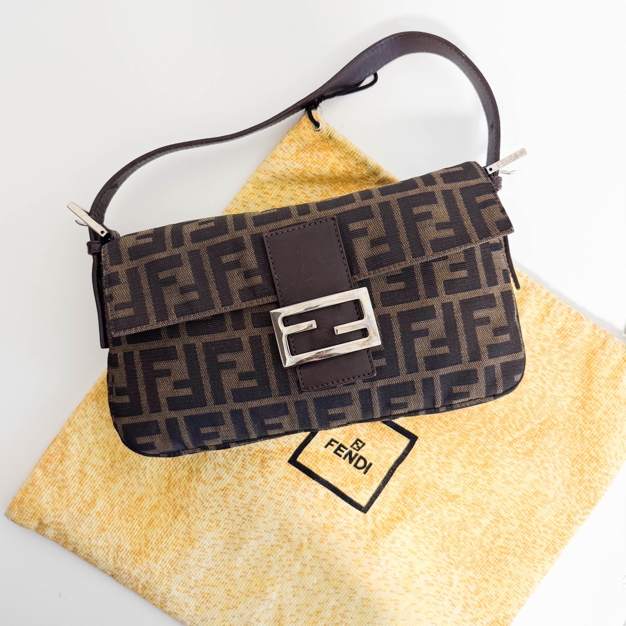 FENDI Baguette Zucca Brown Canvas with Silver Hardware Shoulder Bag, in , Sold by HIVE PRELOVED - Shoulder Bags, ,