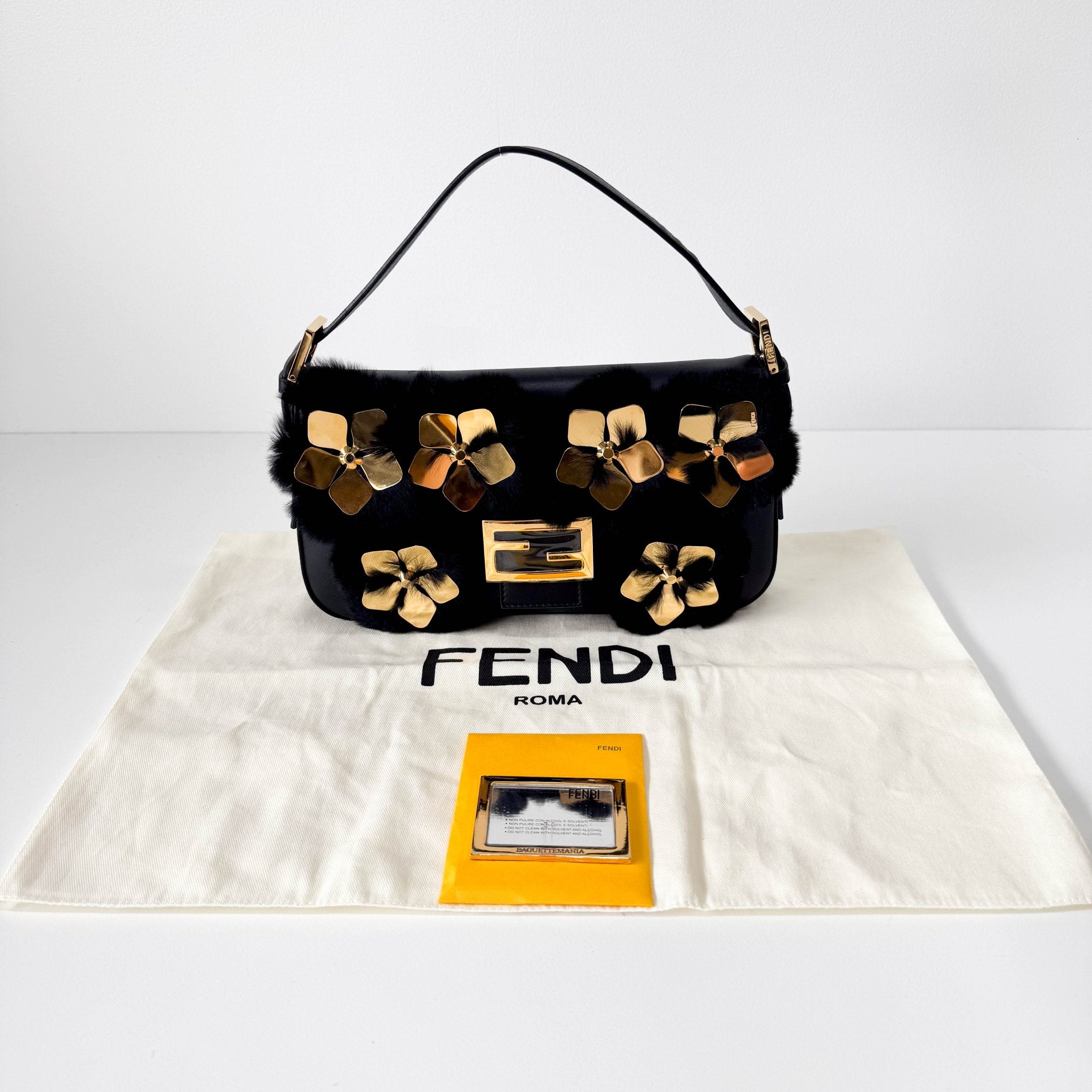 FENDI Black Leather Fur Baguette Bag Adorned With Metal Flower Details, in , Sold by HIVE PRELOVED - Shoulder Bags, ,