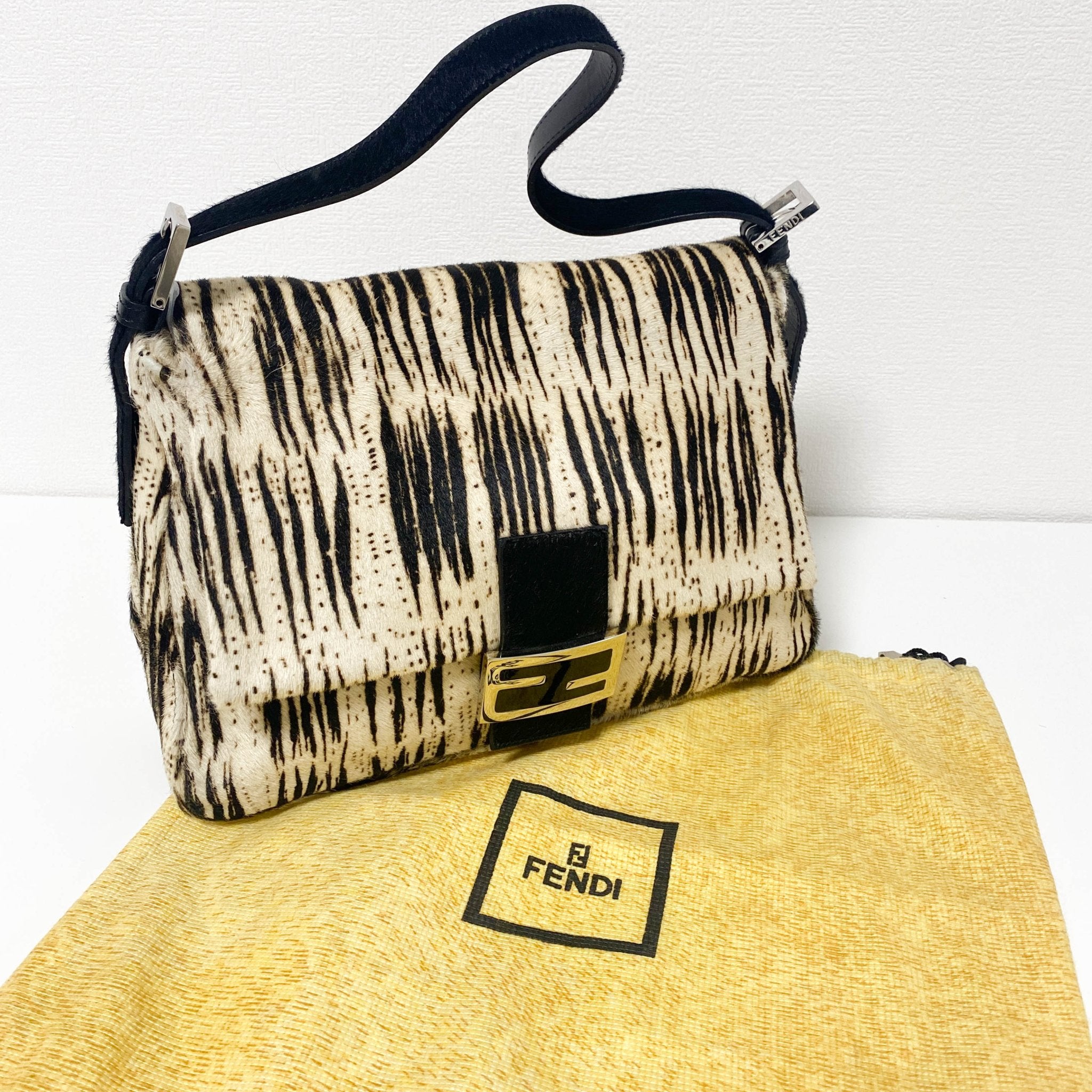 FENDI Zebra Print Pony Hair Baguette Mamma Black, in , Sold by HIVE PRELOVED - Handle Bags, ,