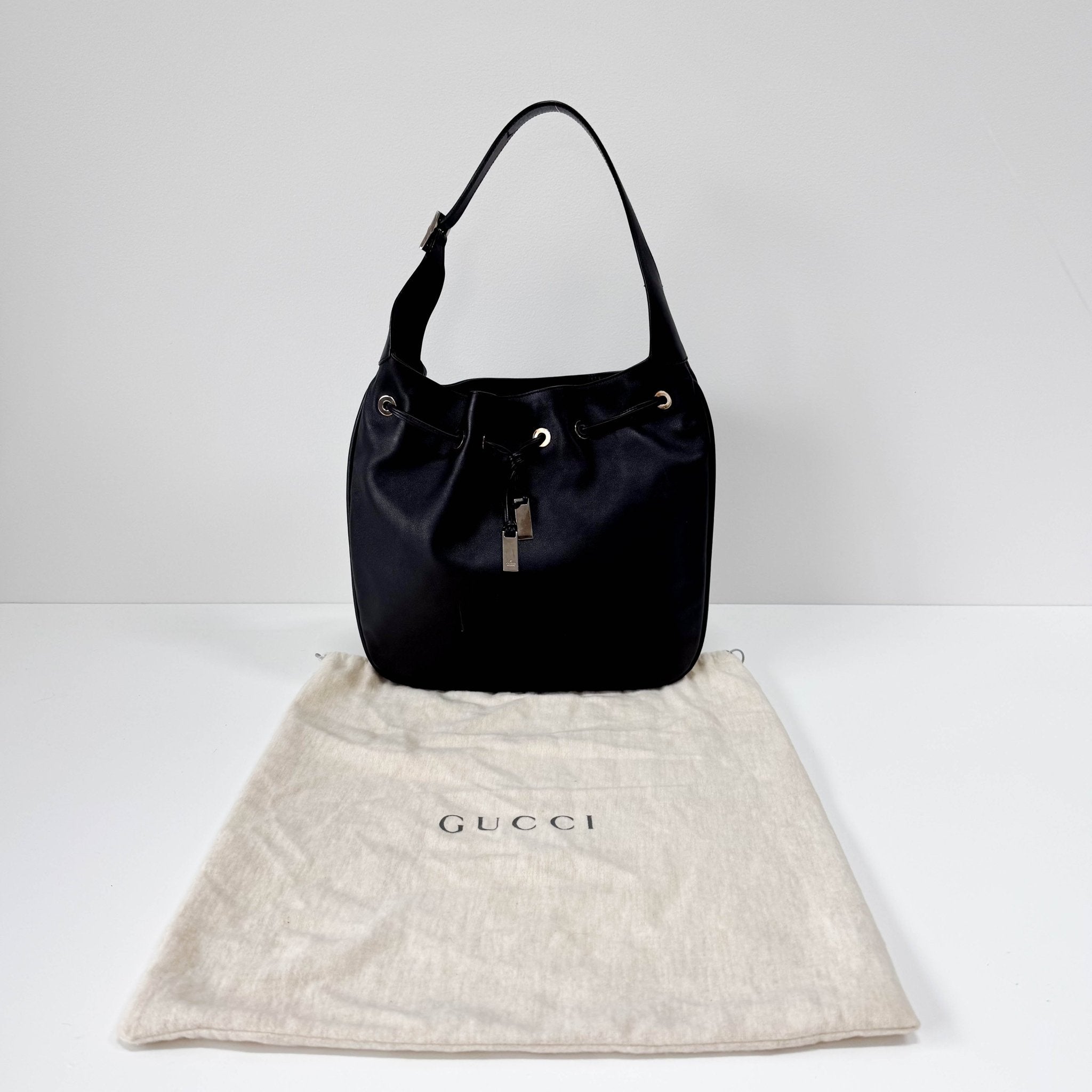 GUCCI Black Leather Drawstring Bag, in , Sold by HIVE PRELOVED - Shoulder Bags, ,