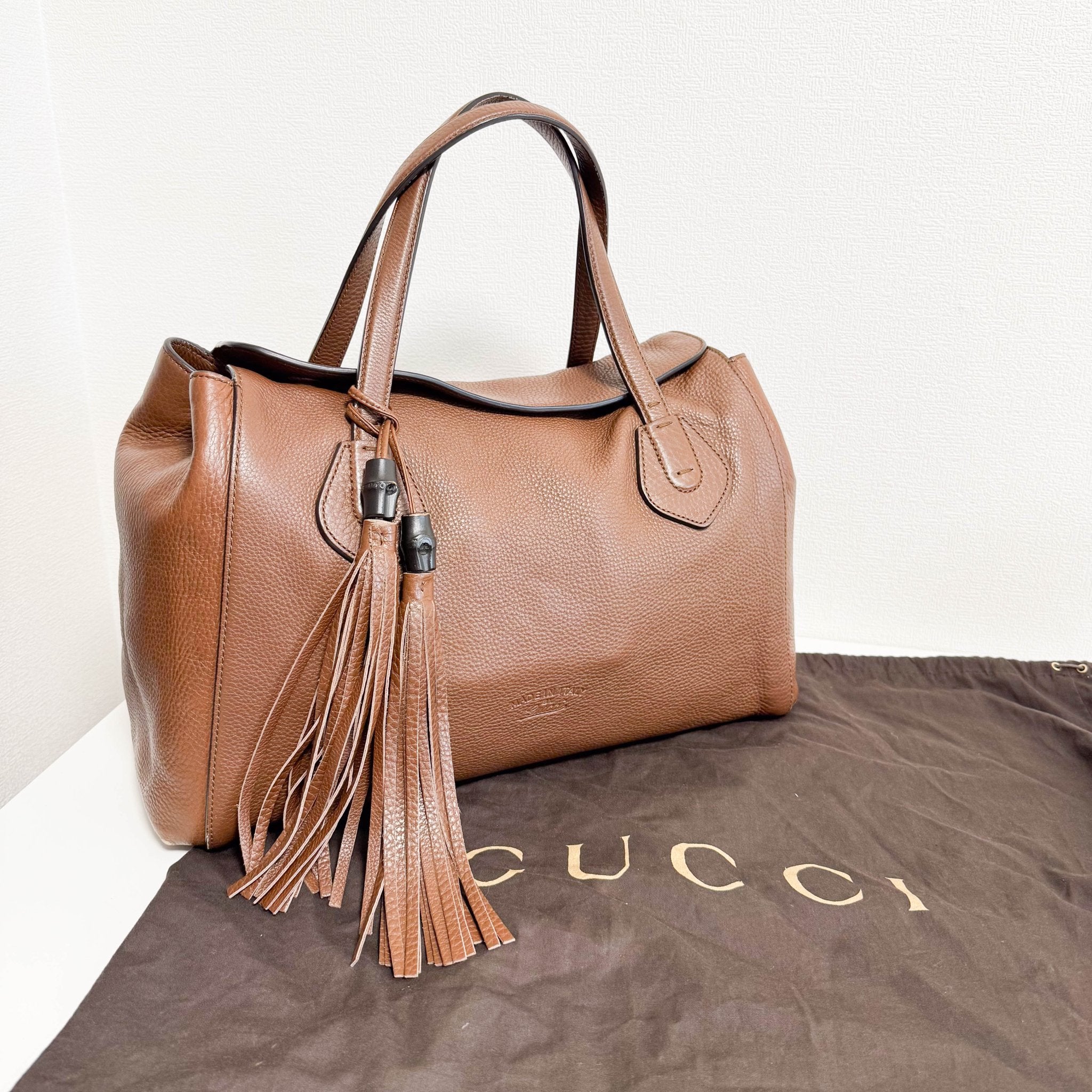 GUCCI Brown Leather Bar Tassel Totes, in , Sold by HIVE PRELOVED - Totes, ,