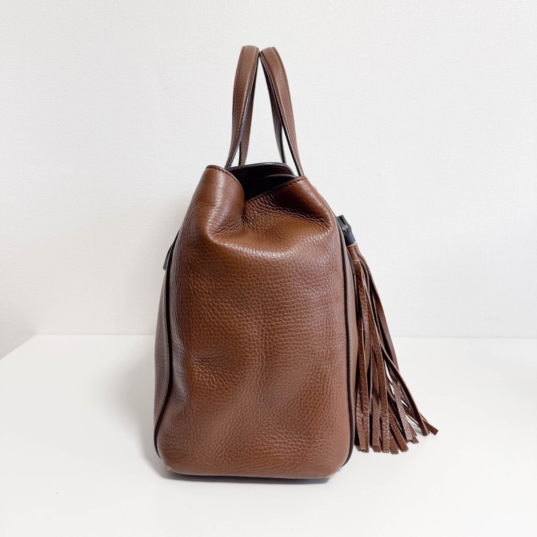 GUCCI Brown Leather Bar Tassel Totes, in , Sold by HIVE PRELOVED - Totes, ,