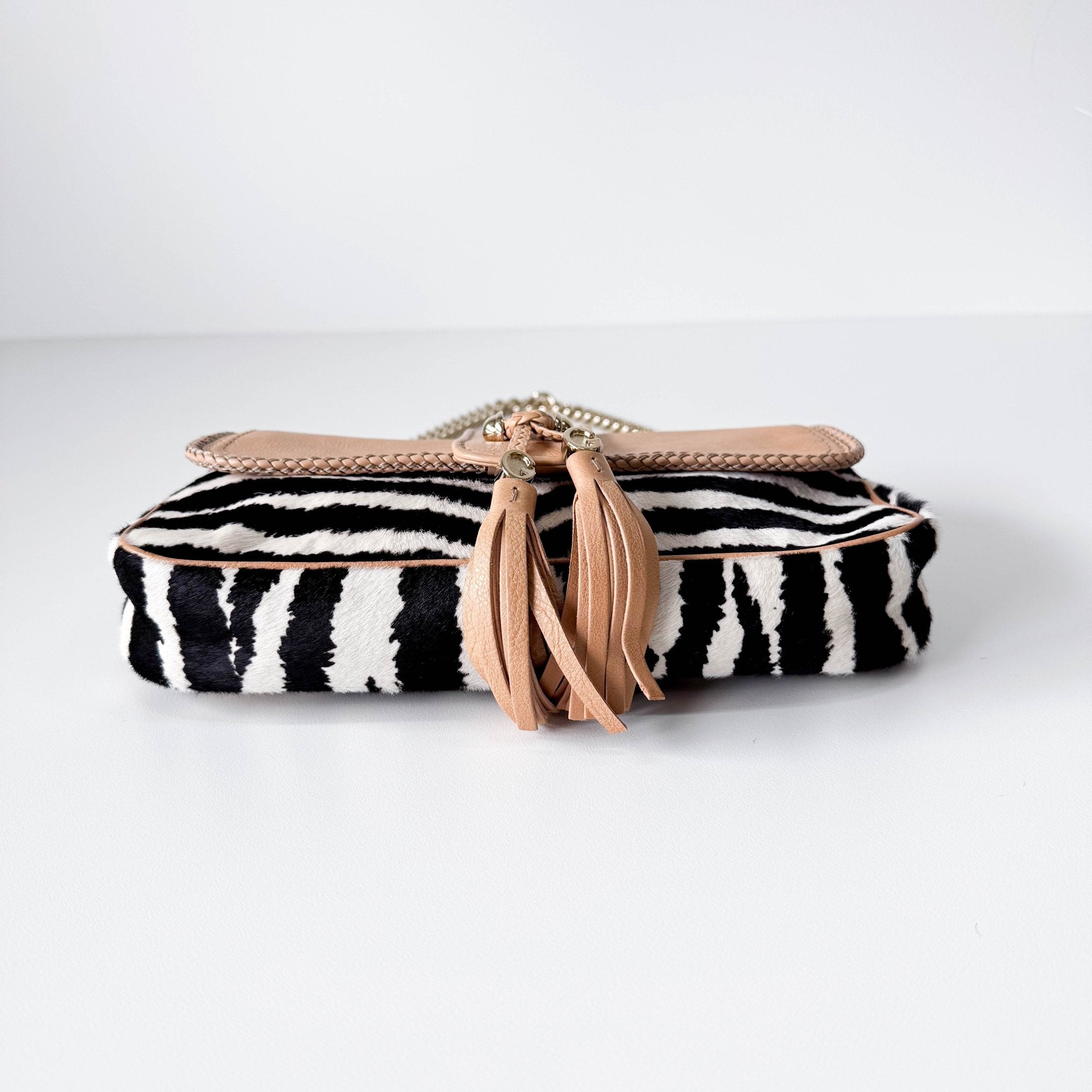 GUCCI Marrakech Zebra Print Pony Hair with Caramel Leather Flap and Tassels Gold Chain Shoulder Bag in Sold by HIVE PRELOVED