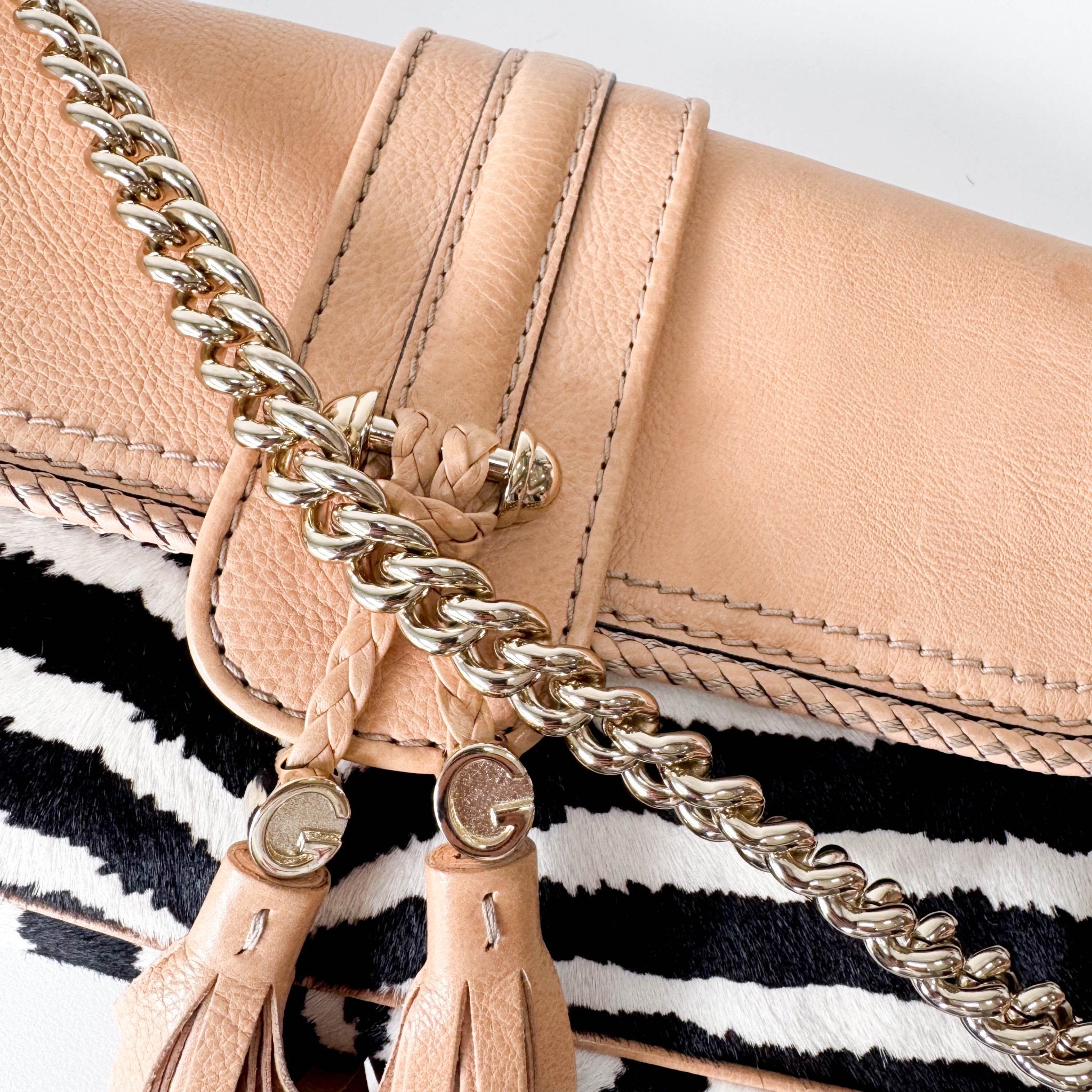GUCCI Marrakech Zebra Print Pony Hair with Caramel Leather Flap and Tassels Gold Chain Shoulder Bag in Sold by HIVE PRELOVED