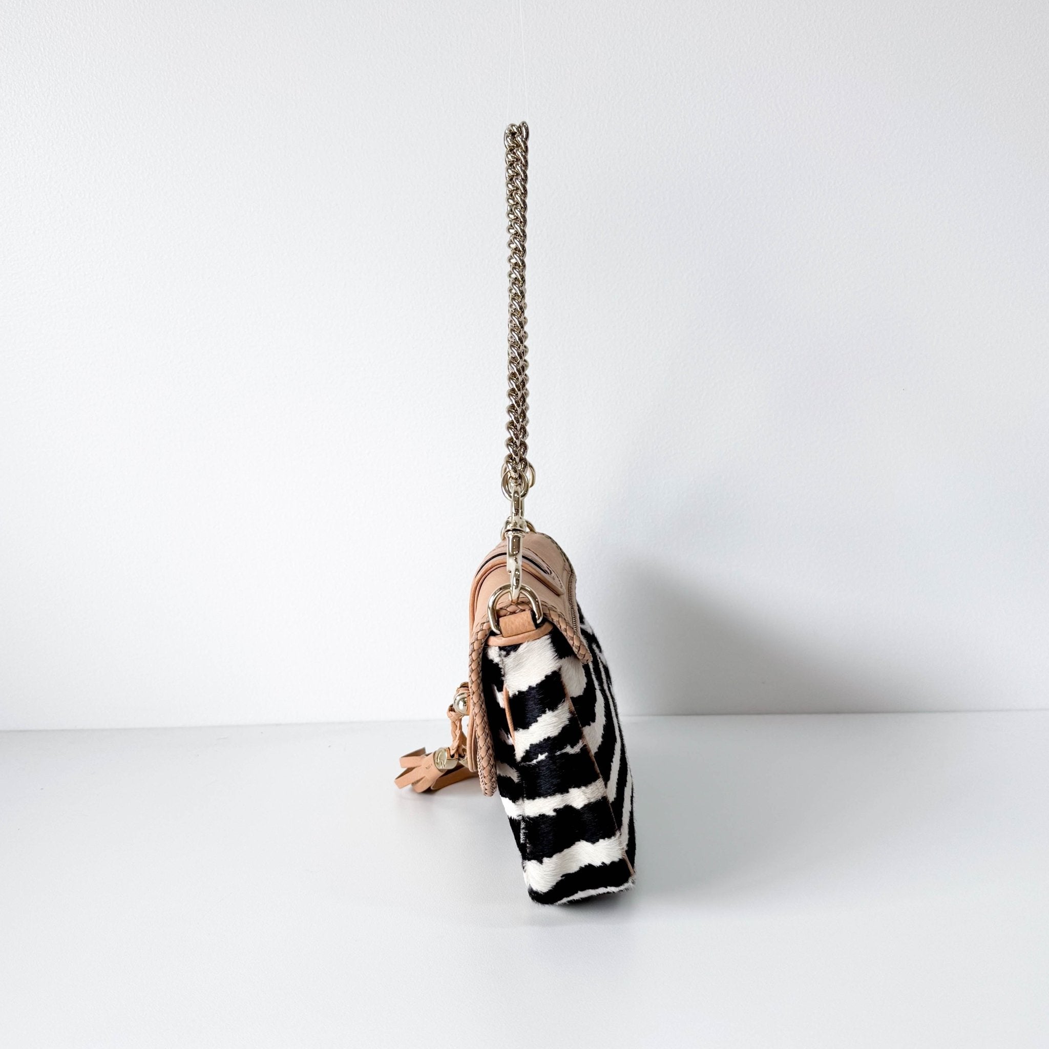 GUCCI Marrakech Zebra Print Pony Hair with Caramel Leather Flap and Tassels Gold Chain Shoulder Bag in Sold by HIVE PRELOVED