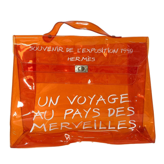 HERMÈS Hermes 1998 Expo Souvenir Orange Vinyl Handbag, in , Sold by HIVE PRELOVED - Handle Bags, ,