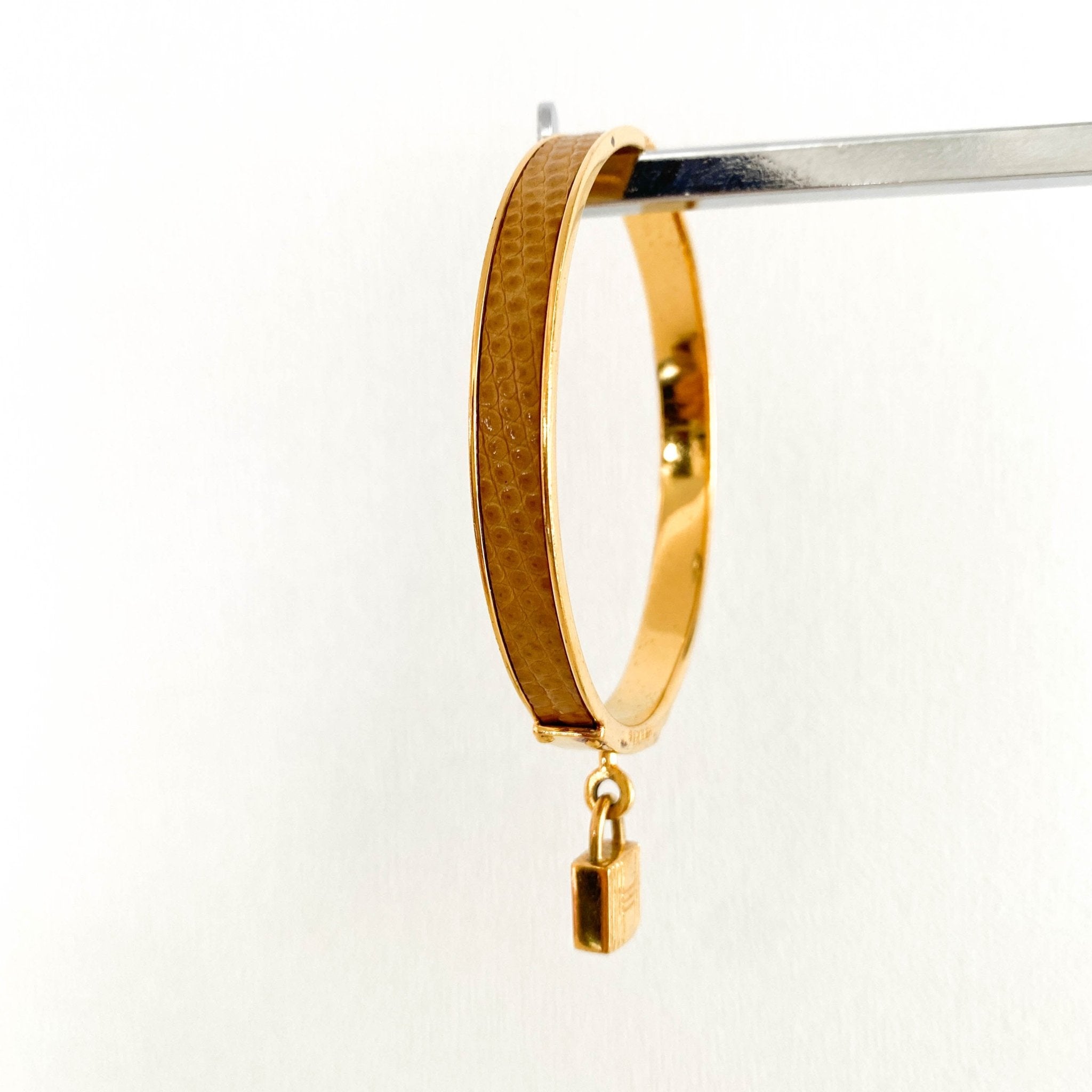 HERMÈS O'Kelly Cadena Lock Gold Plated Bangle, in , Sold by HIVE PRELOVED - Bracelets / Bangles, ,
