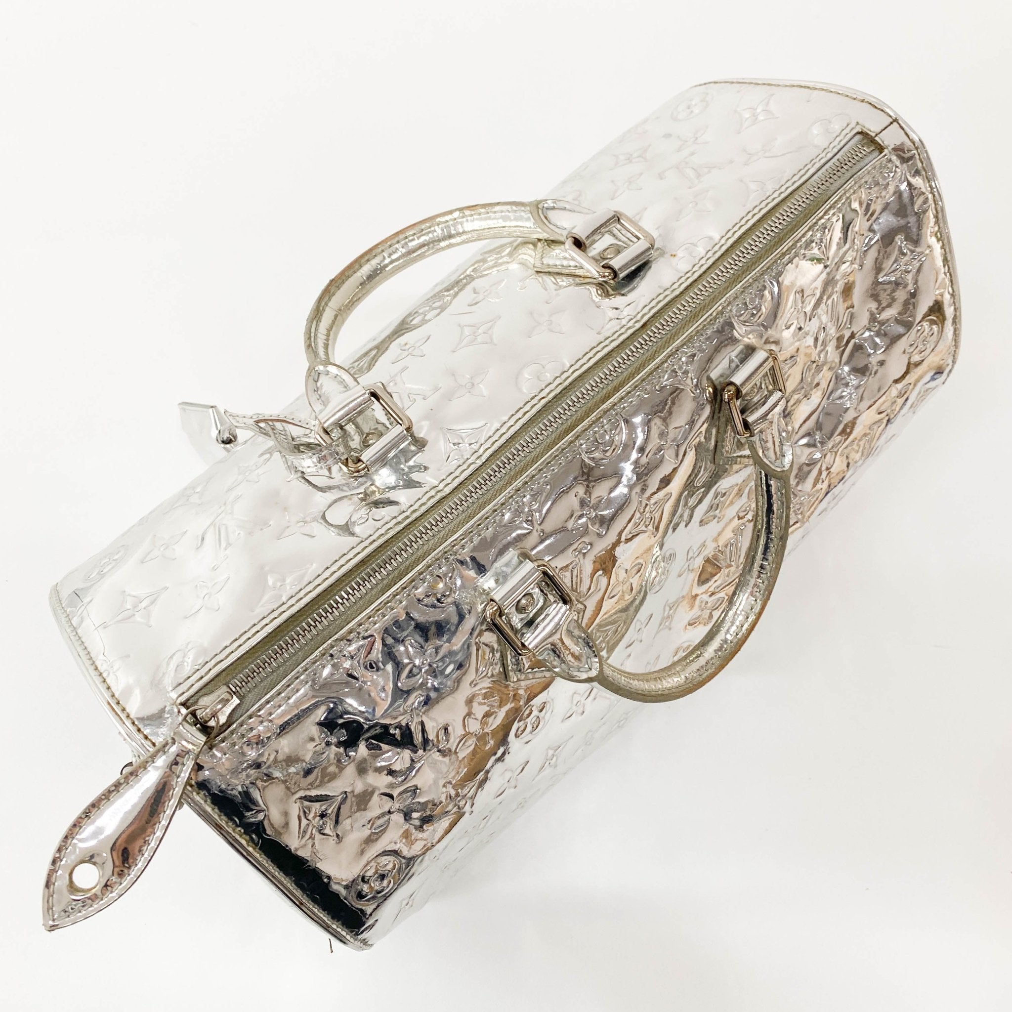 LOUIS VUITTON Louis Vuitton Silver Monogram Mirror Speedy, in , Sold by HIVE PRELOVED - Handle Bags, Shoulder Bags,