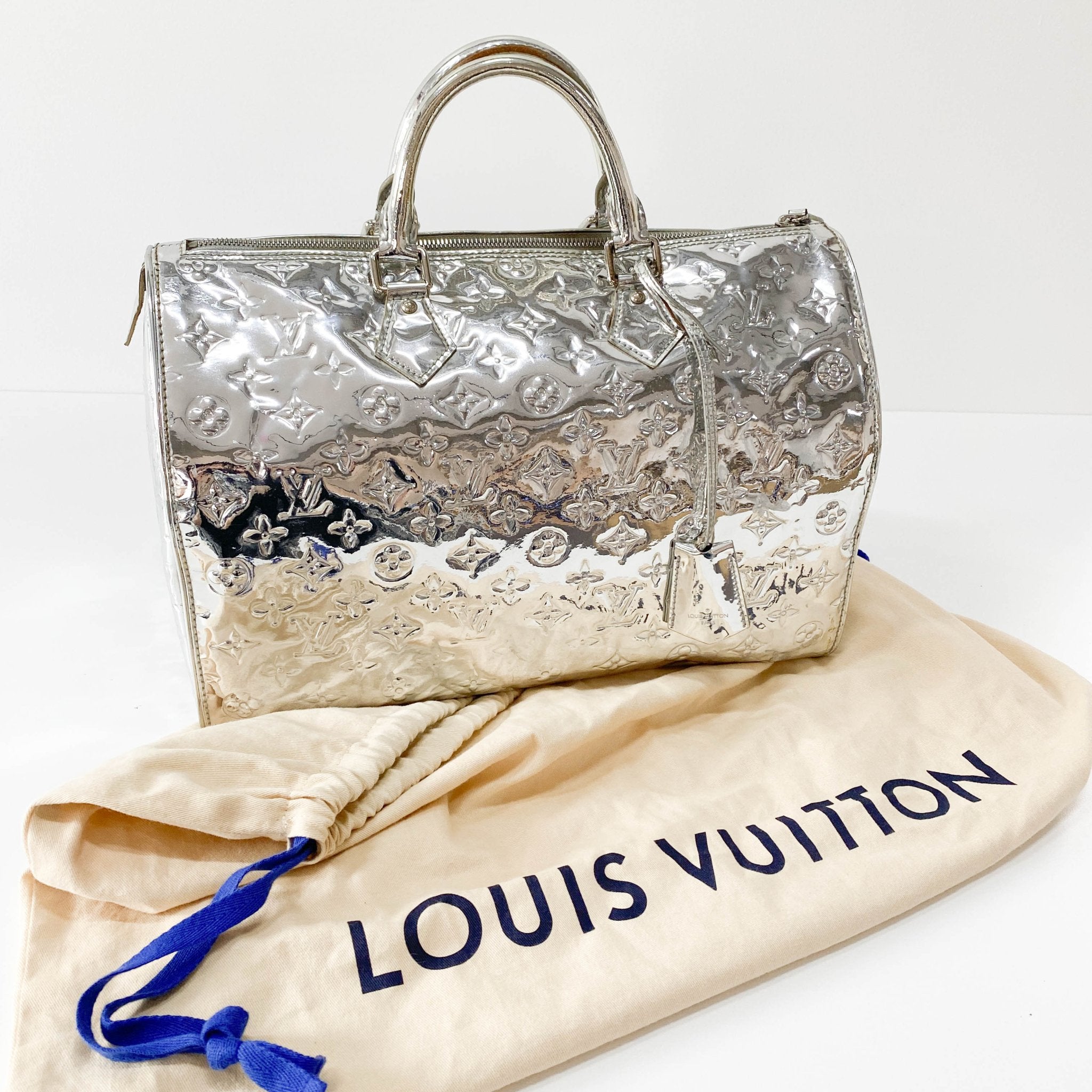LOUIS VUITTON Louis Vuitton Silver Monogram Mirror Speedy, in , Sold by HIVE PRELOVED - Handle Bags, Shoulder Bags,