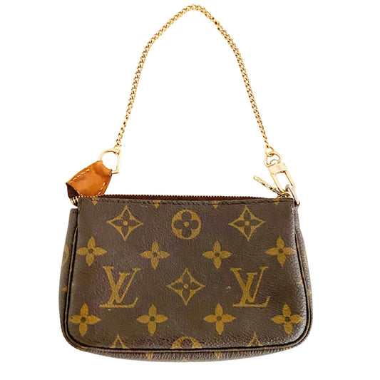 LOUIS VUITTON Mini Pochette Bag Accessories, in , Sold by HIVE PRELOVED - Purses / Wallets, ,