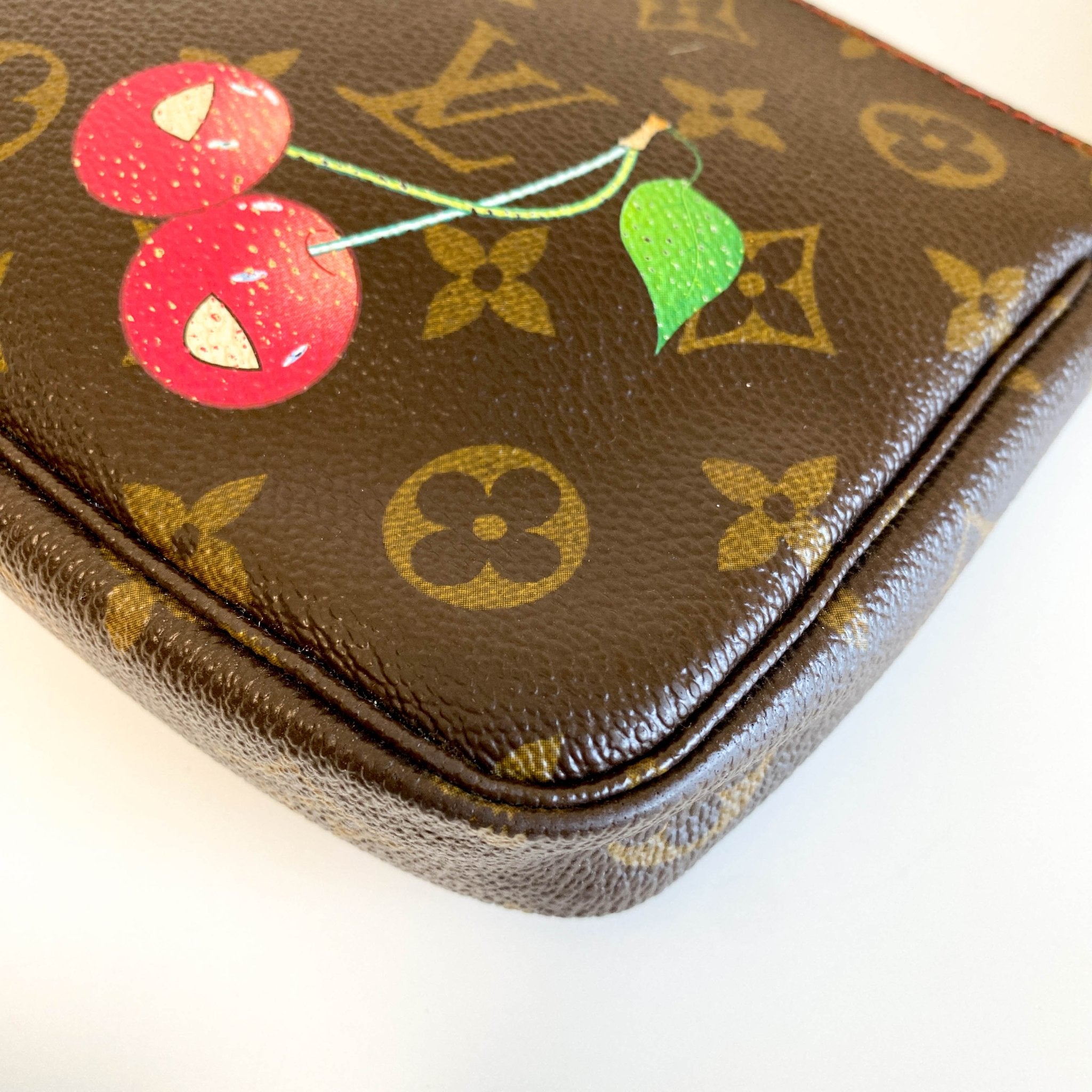 LOUIS VUITTON Monogram Cherry Pochette Accessoire, in , Sold by HIVE PRELOVED - Mini bags, Shoulder Bags,