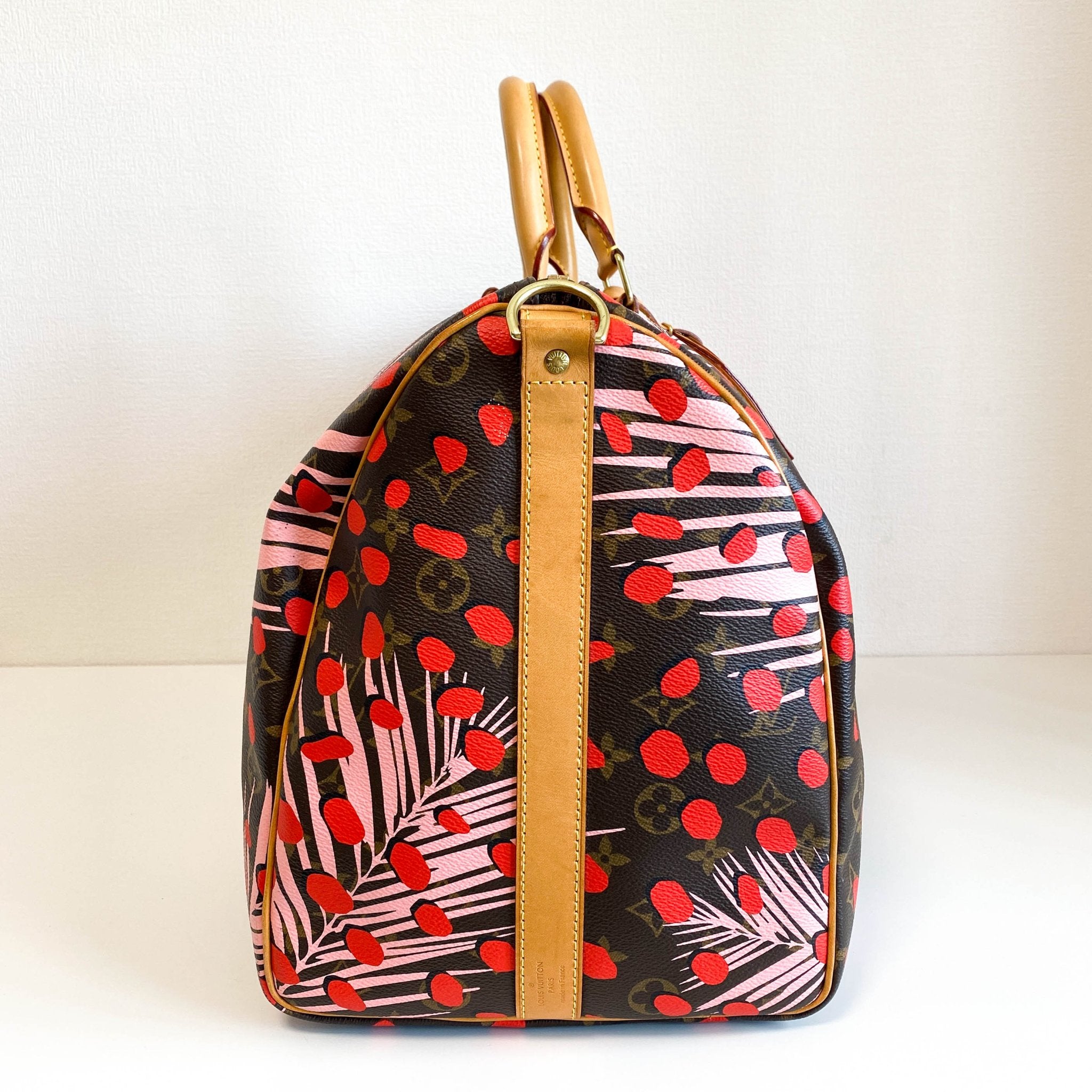 LOUIS VUITTON Monogram Jungle Dots Keepall Bandoulière 50 Sugar Pink Poppy, in , Sold by HIVE PRELOVED - Travel bags, ,