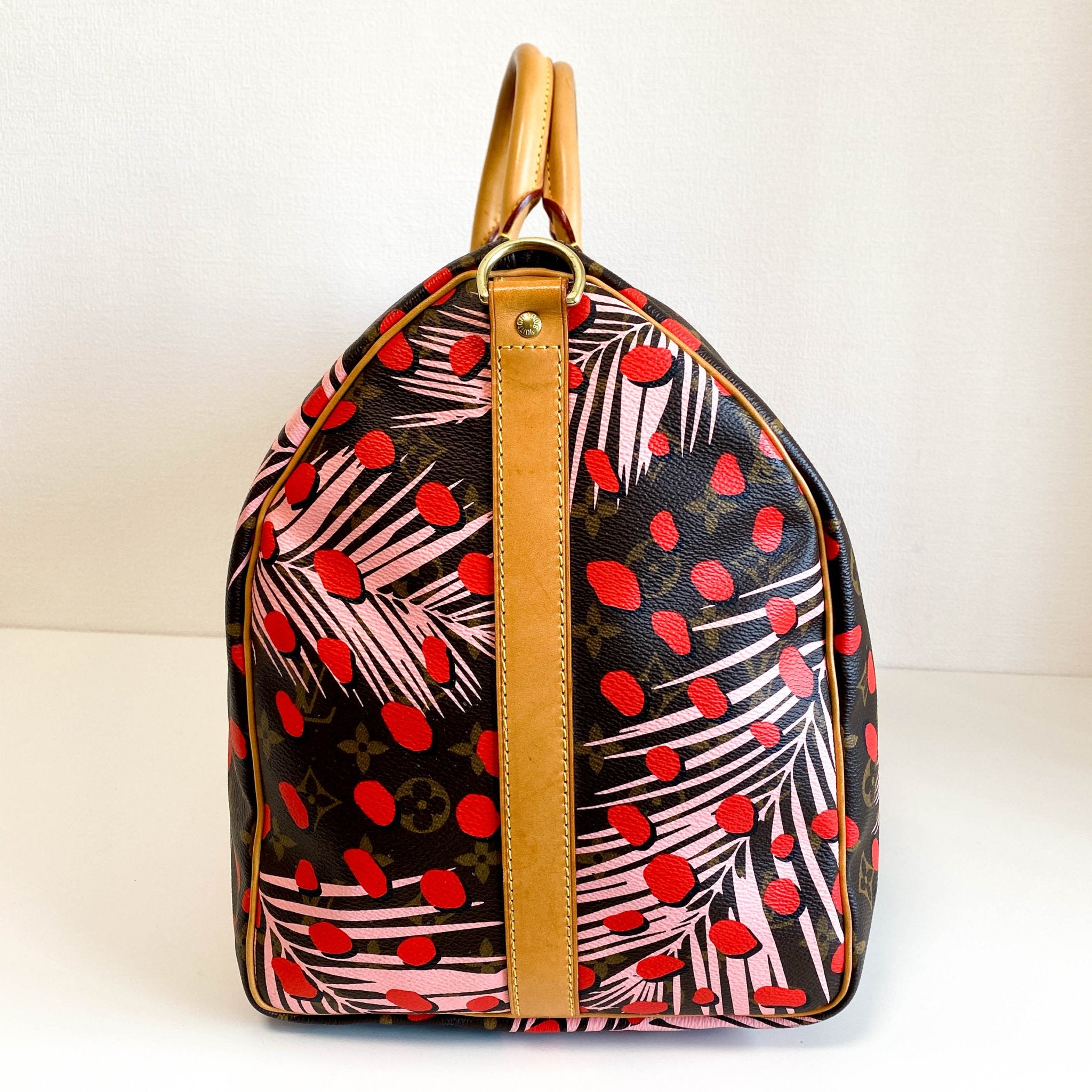 LOUIS VUITTON Monogram Jungle Dots Keepall Bandoulière 50 Sugar Pink Poppy, in , Sold by HIVE PRELOVED - Travel bags, ,