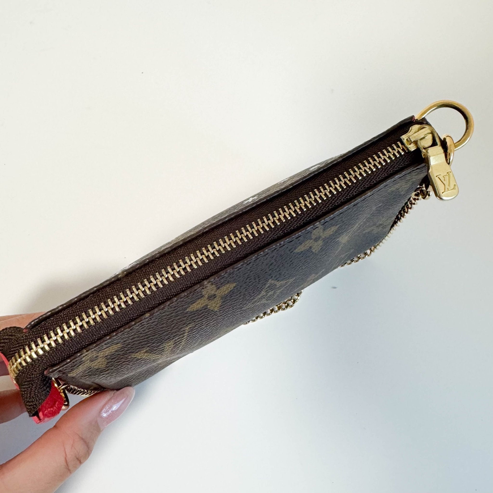 LOUIS VUITTON Monogram Mini Pochette Accessoire Rouge M80863, in , Sold by HIVE PRELOVED - Handle Bags, Shoulder Bags,