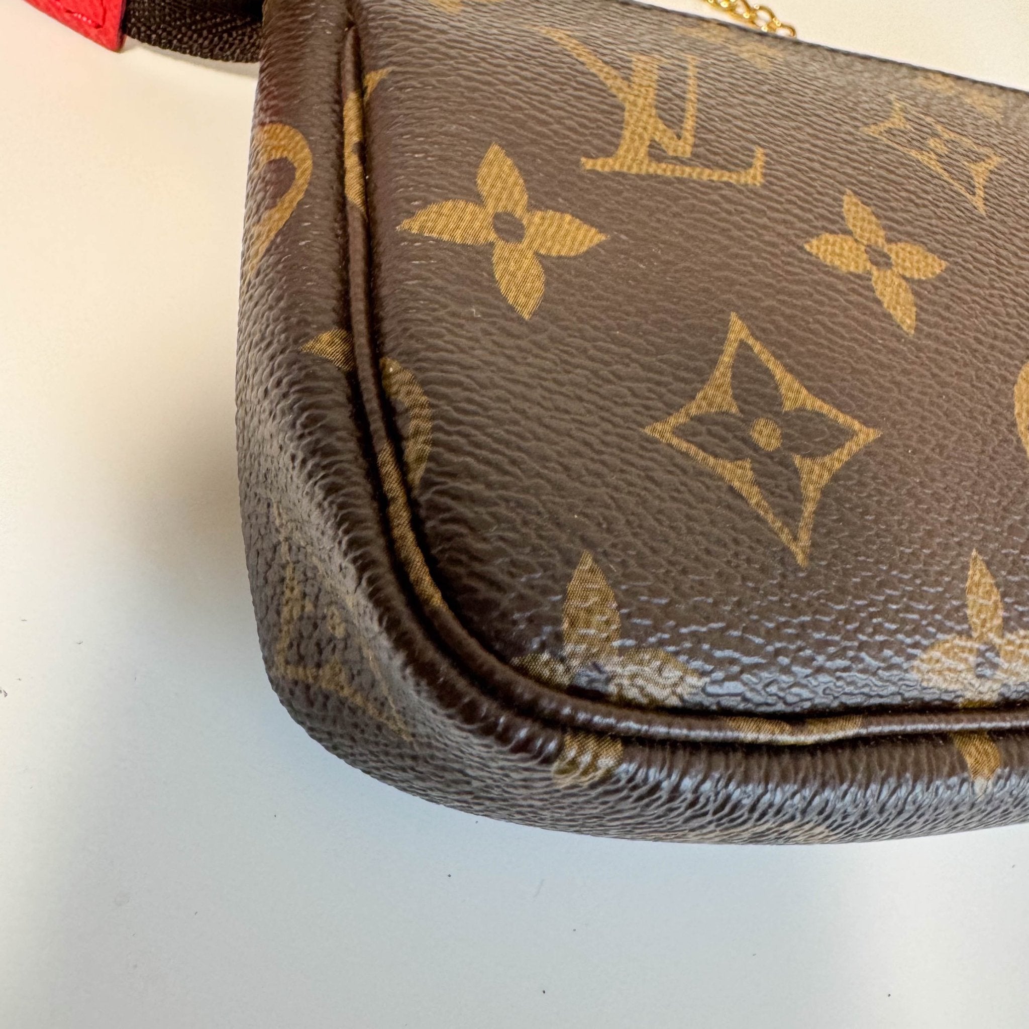 LOUIS VUITTON Monogram Mini Pochette Accessoire Rouge M80863, in , Sold by HIVE PRELOVED - Handle Bags, Shoulder Bags,