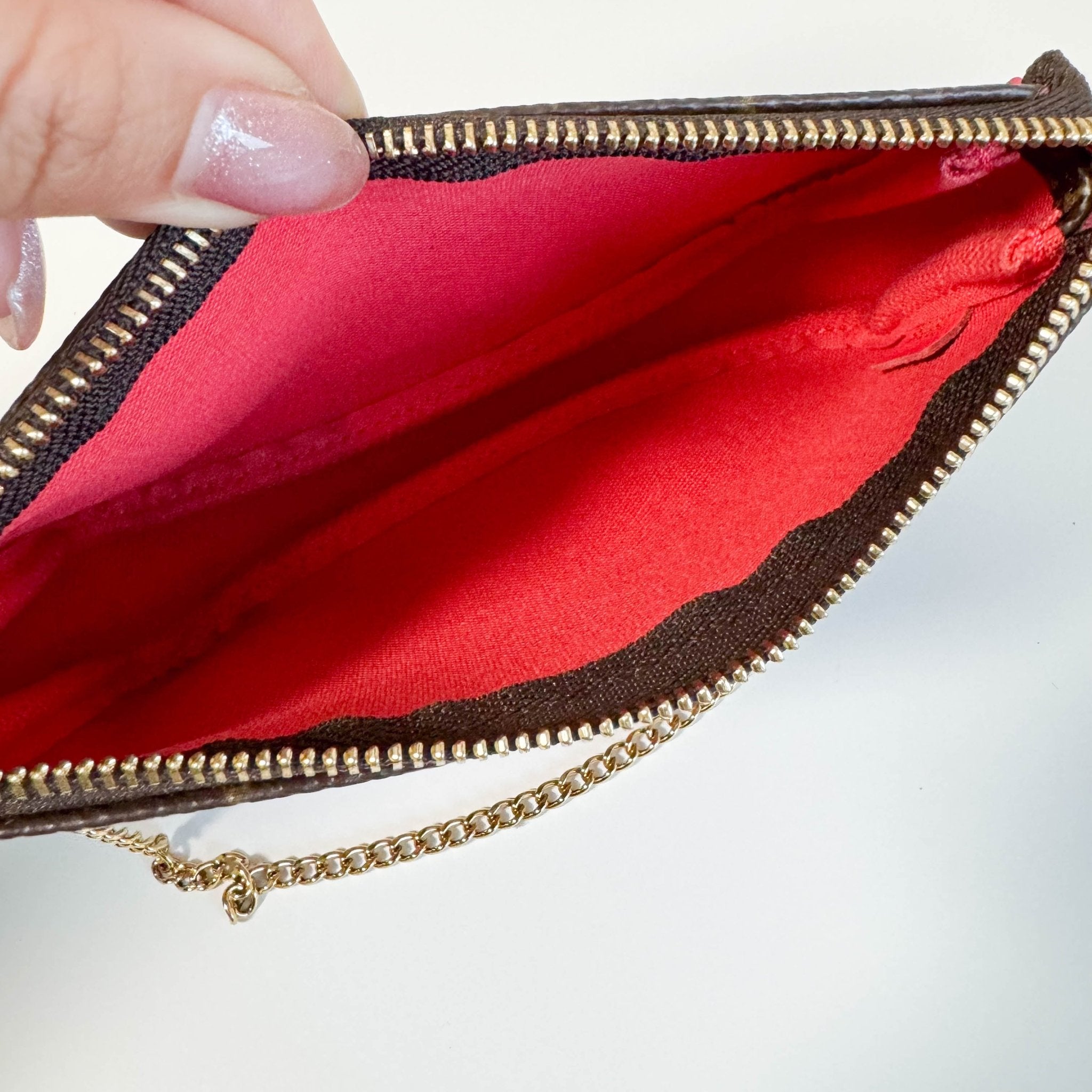 LOUIS VUITTON Monogram Mini Pochette Accessoire Rouge M80863, in , Sold by HIVE PRELOVED - Handle Bags, Shoulder Bags,