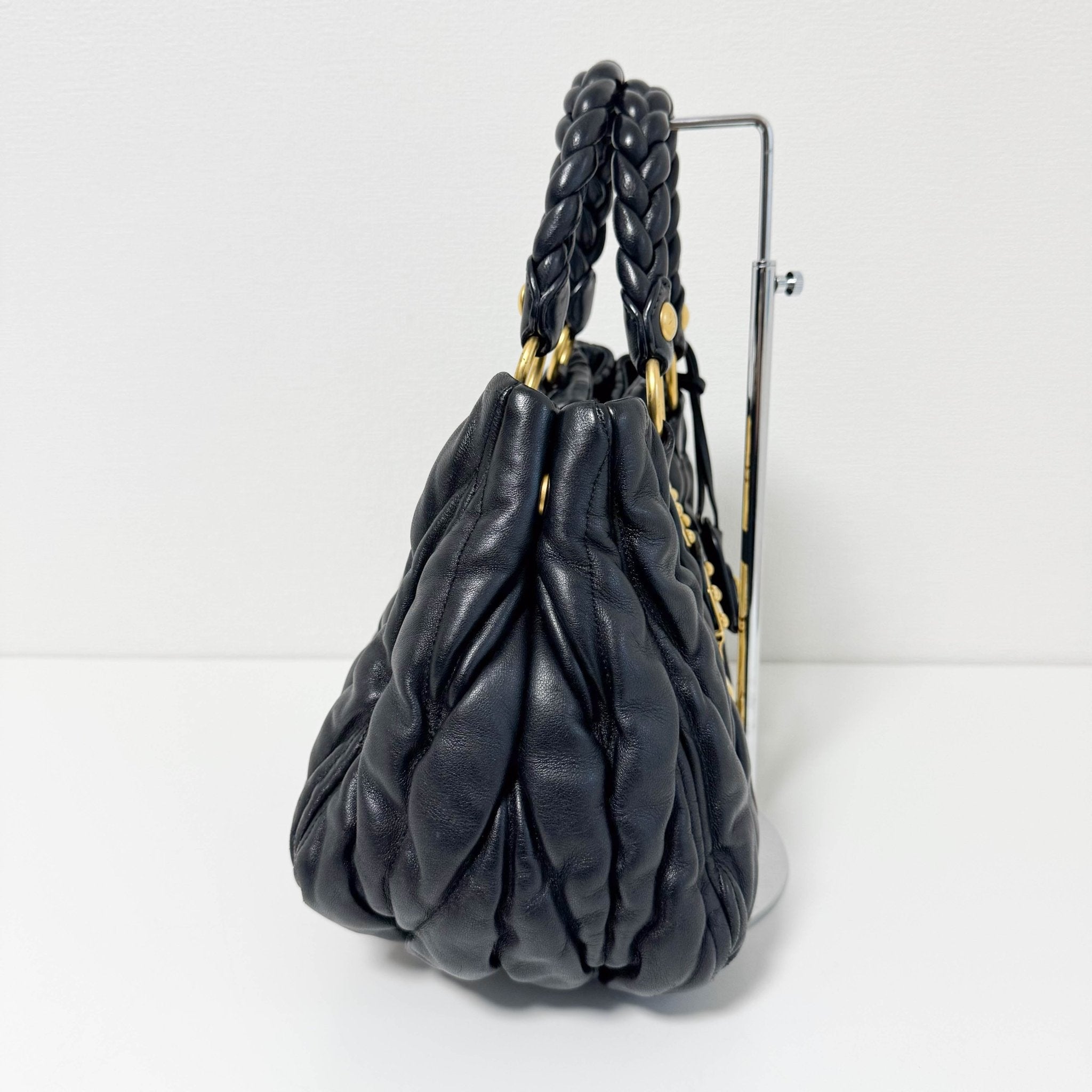 MIU MIU Matelasse Navy Leather Top Handle Bag With Crossbody Strap, in , Sold by HIVE PRELOVED - Crossbody bags, Handle Bags,