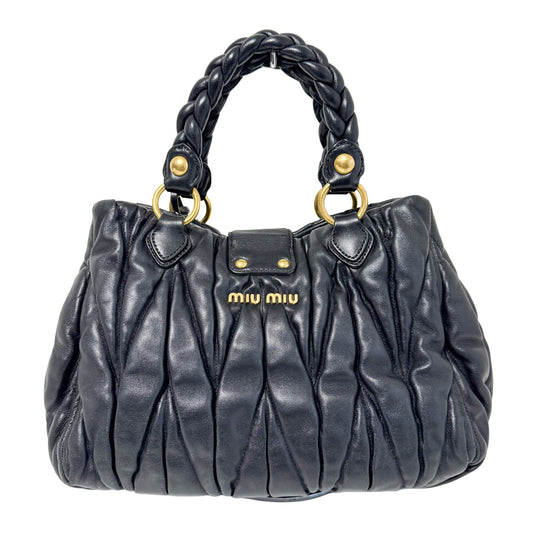 MIU MIU Matelasse Navy Leather Top Handle Bag With Crossbody Strap, in , Sold by HIVE PRELOVED - Crossbody bags, Handle Bags,