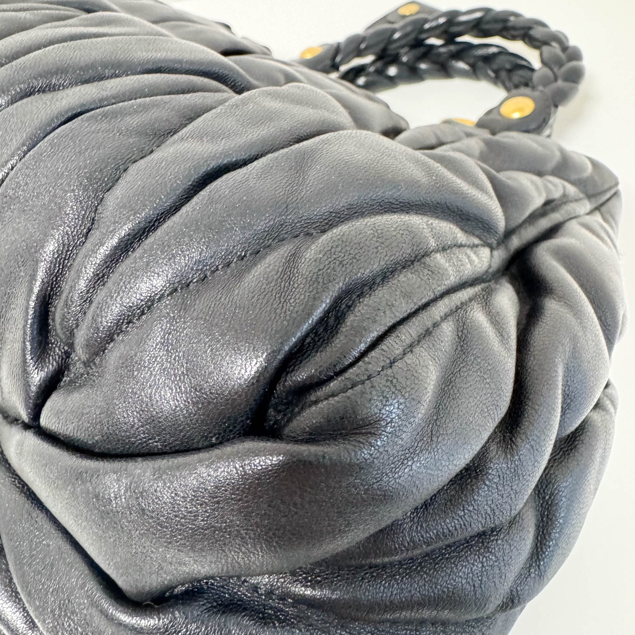 MIU MIU Matelasse Navy Leather Top Handle Bag With Crossbody Strap, in , Sold by HIVE PRELOVED - Crossbody bags, Handle Bags,