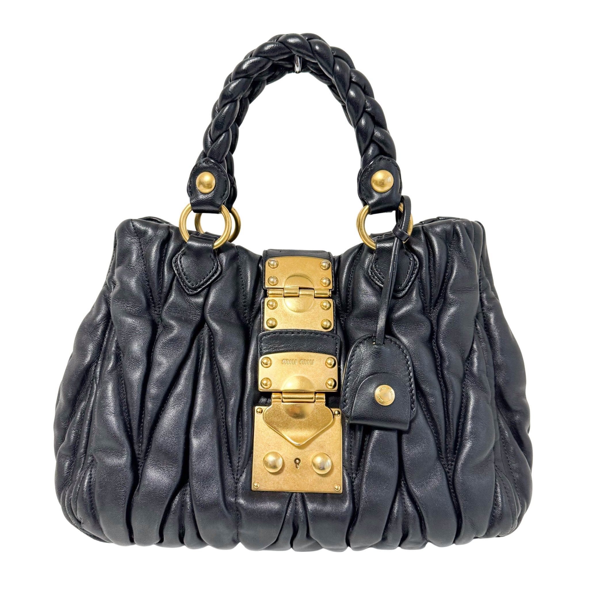 MIU MIU Matelasse Navy Leather Top Handle Bag With Crossbody Strap, in , Sold by HIVE PRELOVED - Crossbody bags, Handle Bags,