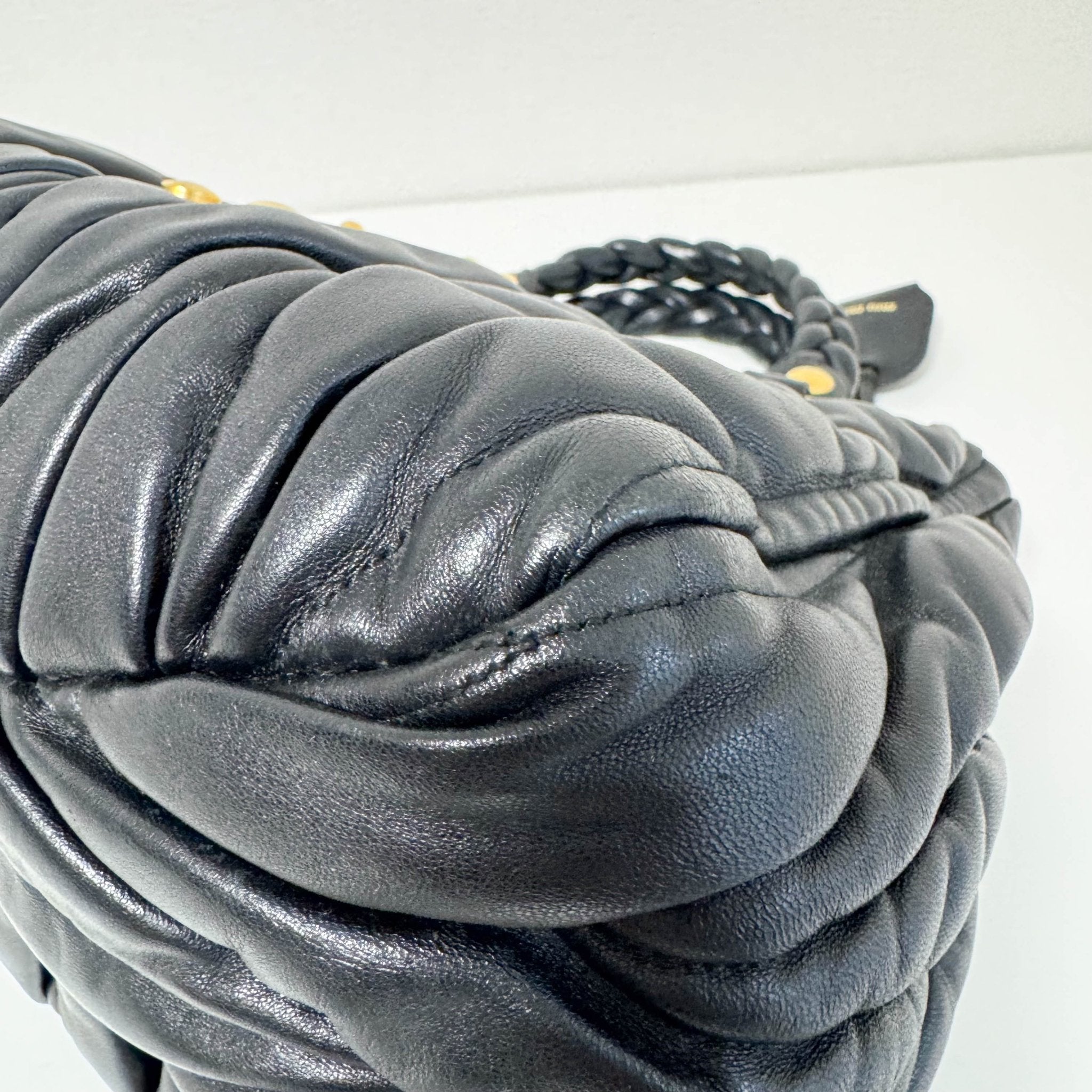 MIU MIU Matelasse Navy Leather Top Handle Bag With Crossbody Strap, in , Sold by HIVE PRELOVED - Crossbody bags, Handle Bags,