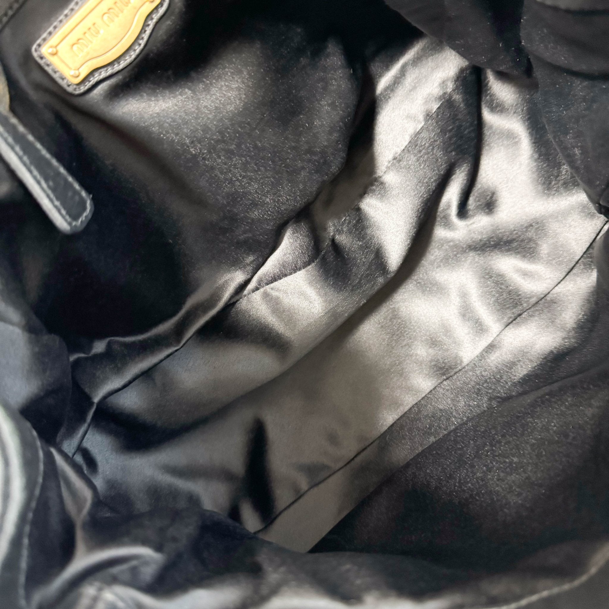 MIU MIU Matelasse Navy Leather Top Handle Bag With Crossbody Strap, in , Sold by HIVE PRELOVED - Crossbody bags, Handle Bags,