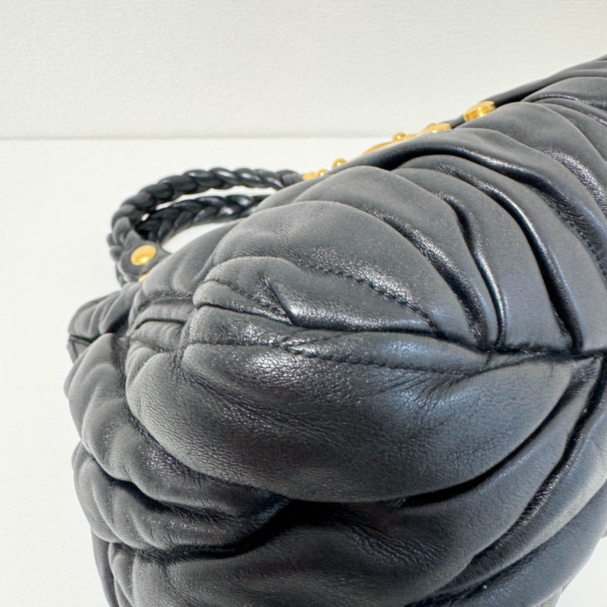 MIU MIU Matelasse Navy Leather Top Handle Bag With Crossbody Strap, in , Sold by HIVE PRELOVED - Crossbody bags, Handle Bags,