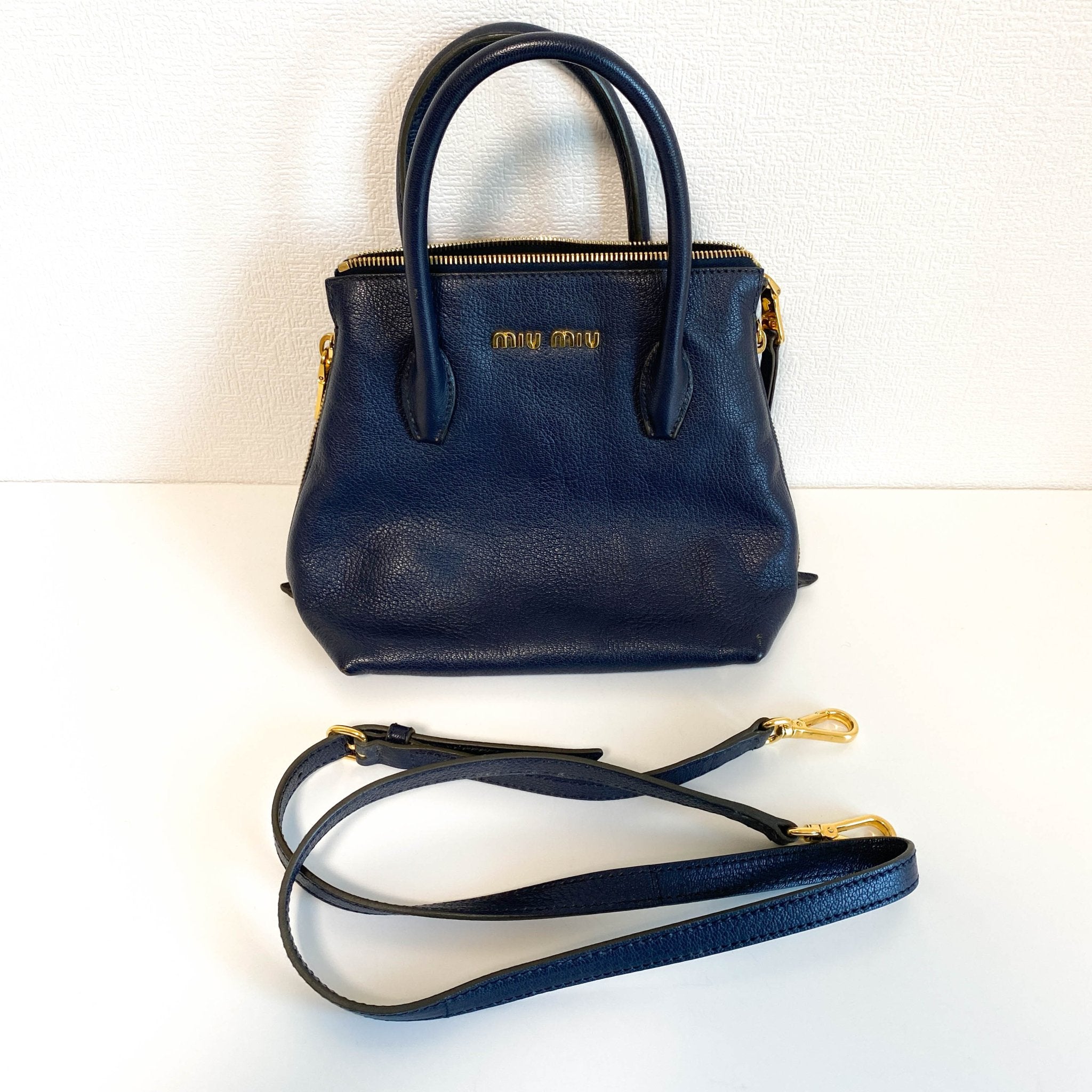 MIU MIU Navy Leather Top Handle With Crossbody Strap Bag, in , Sold by HIVE PRELOVED - Crossbody bags, Handle Bags,