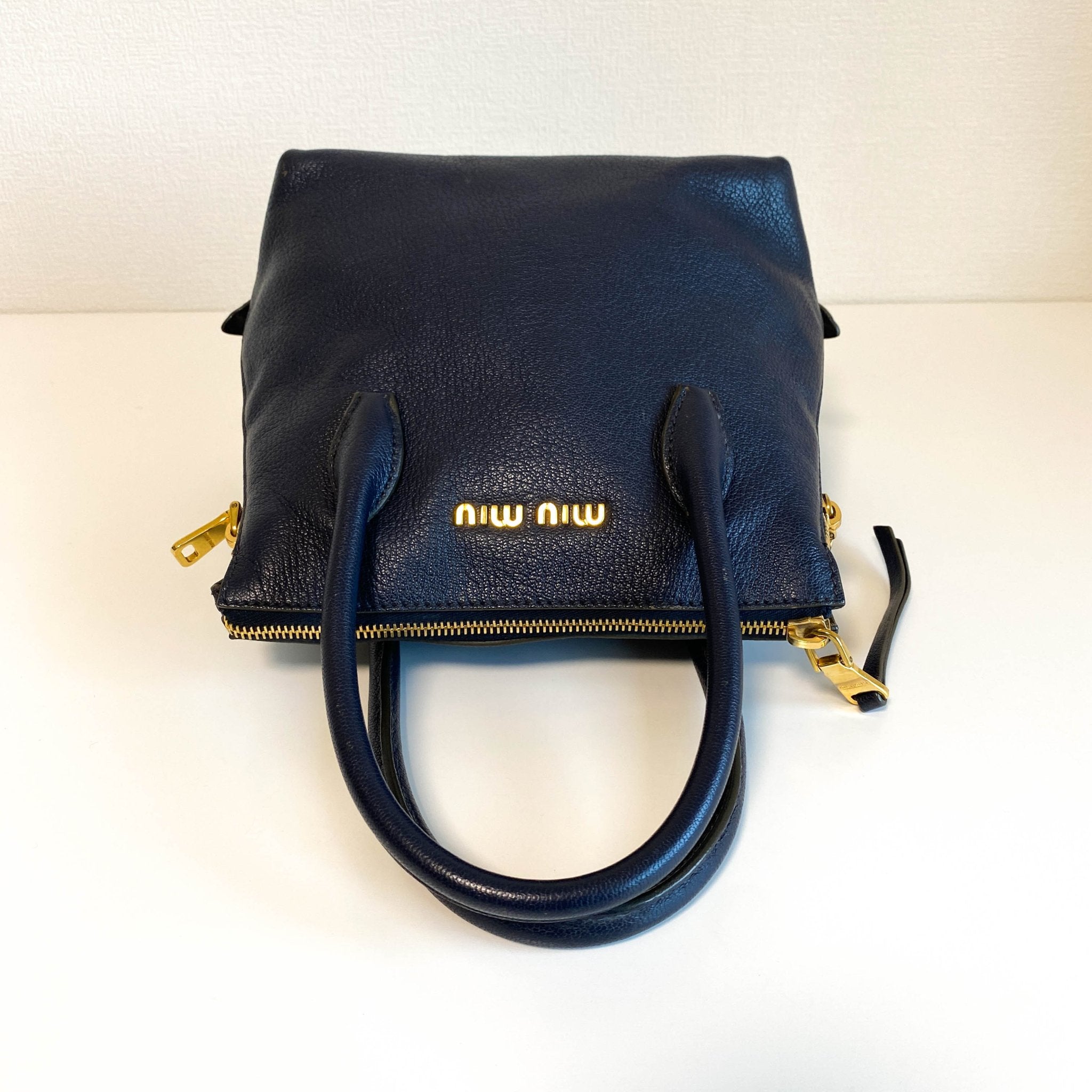 MIU MIU Navy Leather Top Handle With Crossbody Strap Bag, in , Sold by HIVE PRELOVED - Crossbody bags, Handle Bags,
