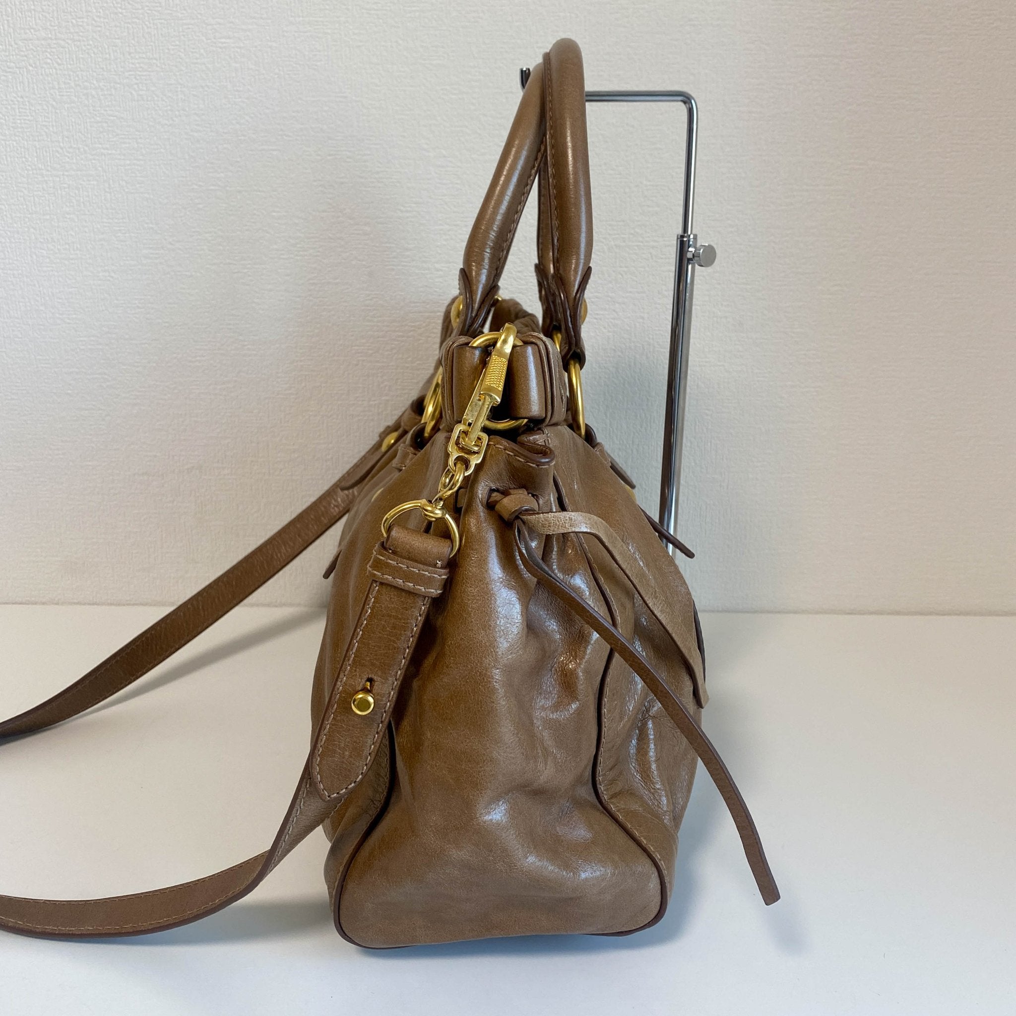 MIU MIU Vitello Bauletto Brown Leather Handbag, in , Sold by HIVE PRELOVED - Crossbody bags, Handle Bags,