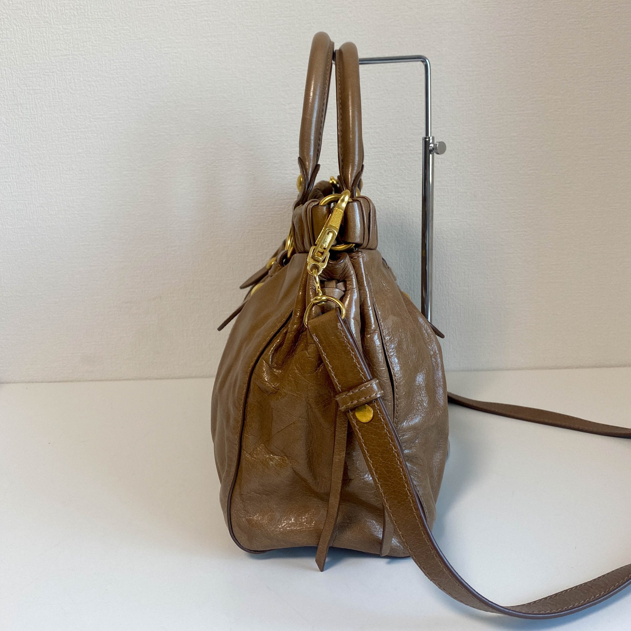 MIU MIU Vitello Bauletto Brown Leather Handbag, in , Sold by HIVE PRELOVED - Crossbody bags, Handle Bags,