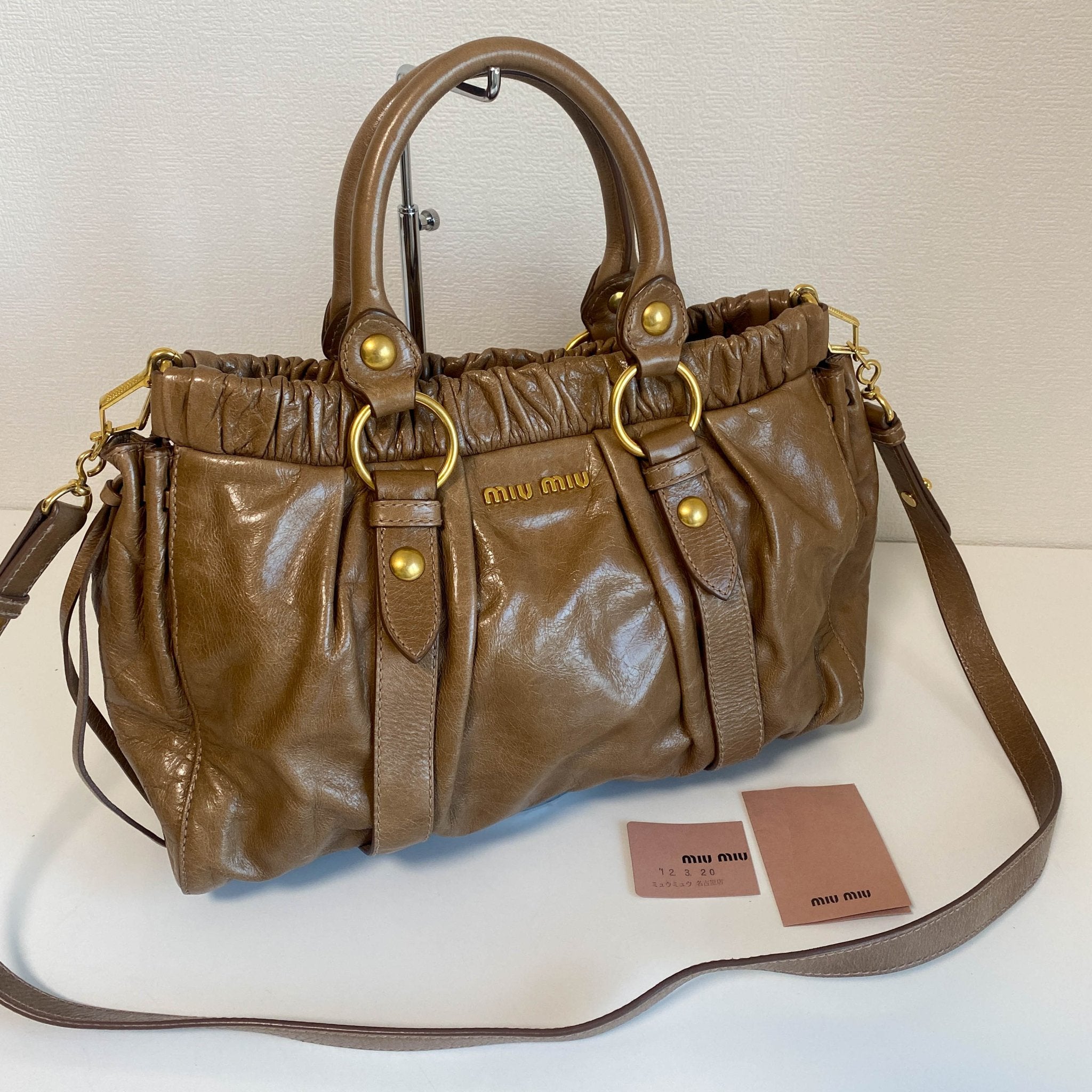 MIU MIU Vitello Bauletto Brown Leather Handbag, in , Sold by HIVE PRELOVED - Crossbody bags, Handle Bags,