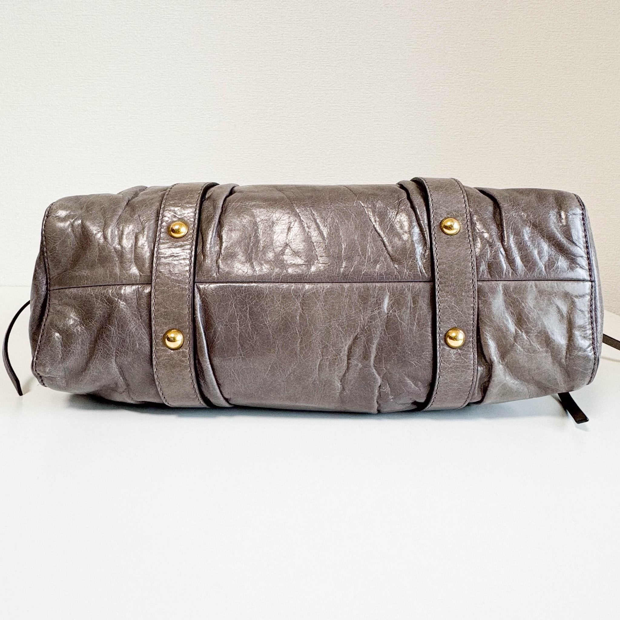 MIU MIU Vitello Bauletto Leather Handbag Grey, in , Sold by HIVE PRELOVED - Crossbody bags, Handle Bags,