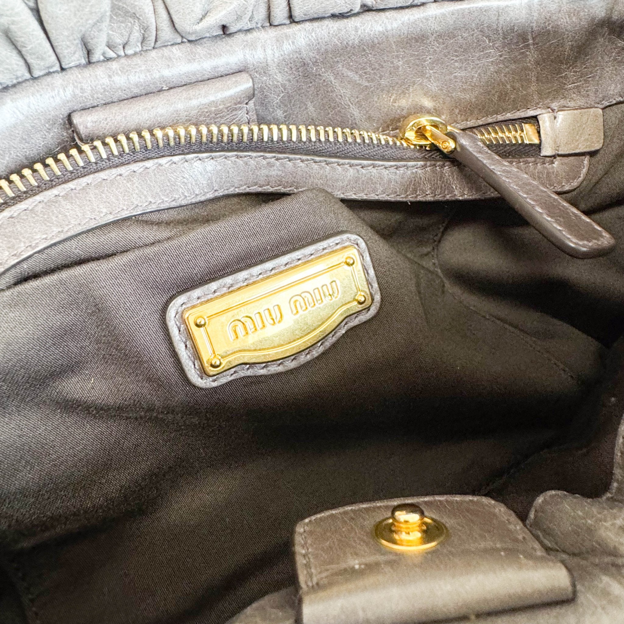 MIU MIU Vitello Bauletto Leather Handbag Grey, in , Sold by HIVE PRELOVED - Crossbody bags, Handle Bags,