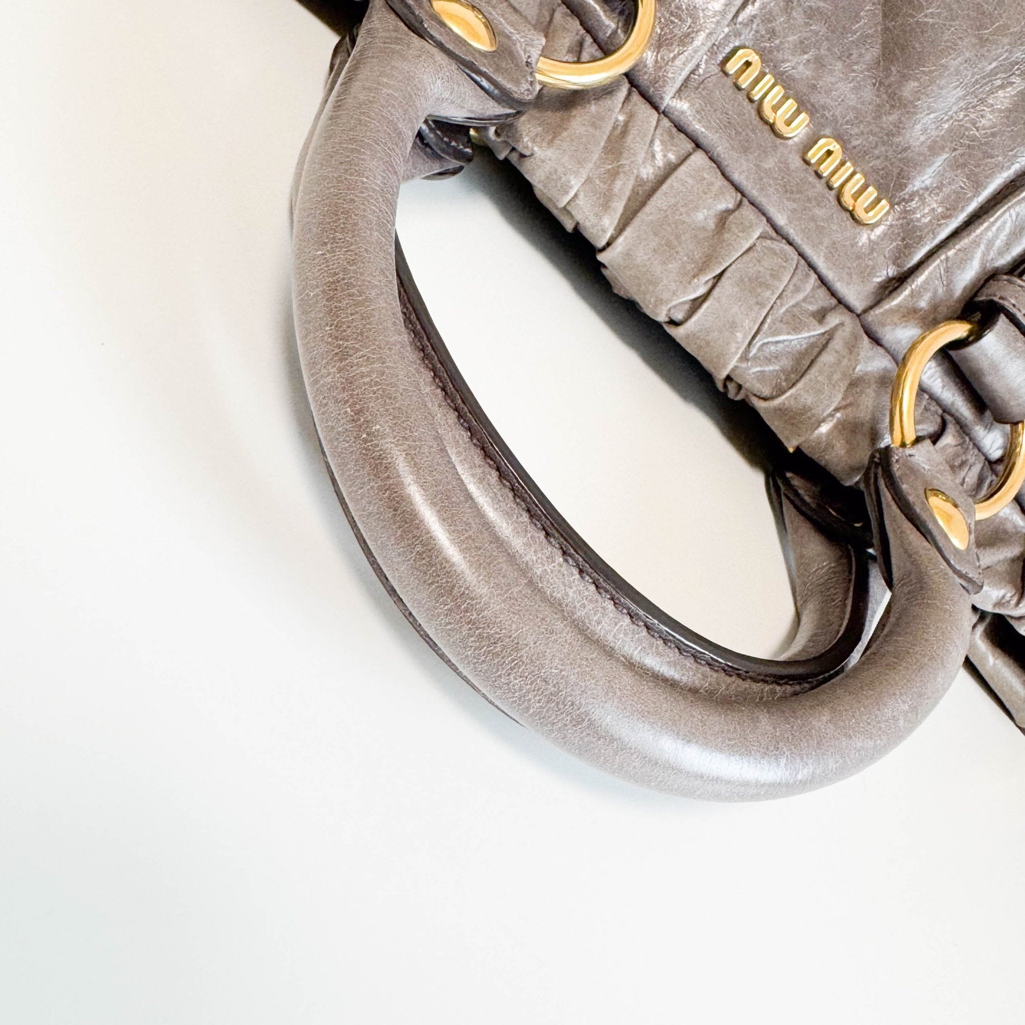 MIU MIU Vitello Bauletto Leather Handbag Grey, in , Sold by HIVE PRELOVED - Crossbody bags, Handle Bags,