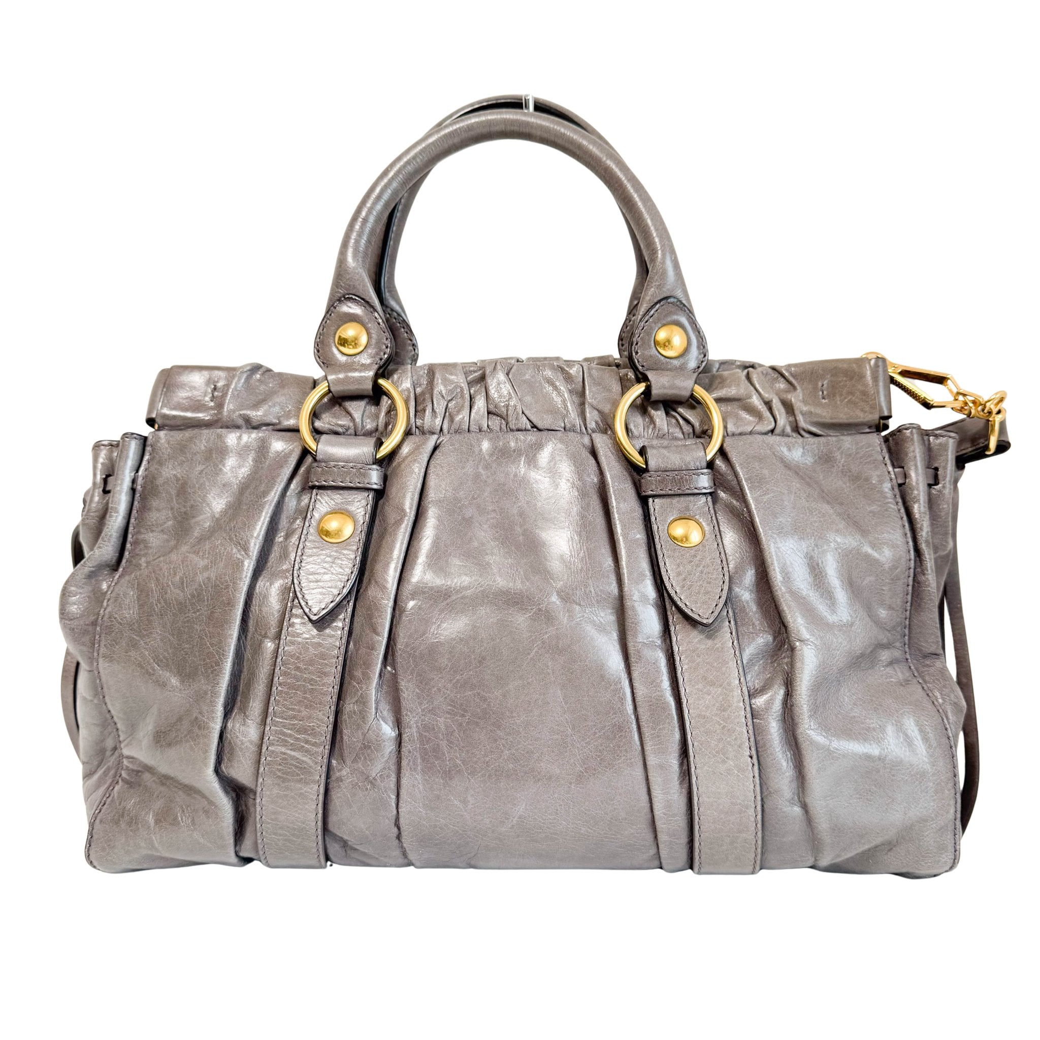 MIU MIU Vitello Bauletto Leather Handbag Grey, in , Sold by HIVE PRELOVED - Crossbody bags, Handle Bags,