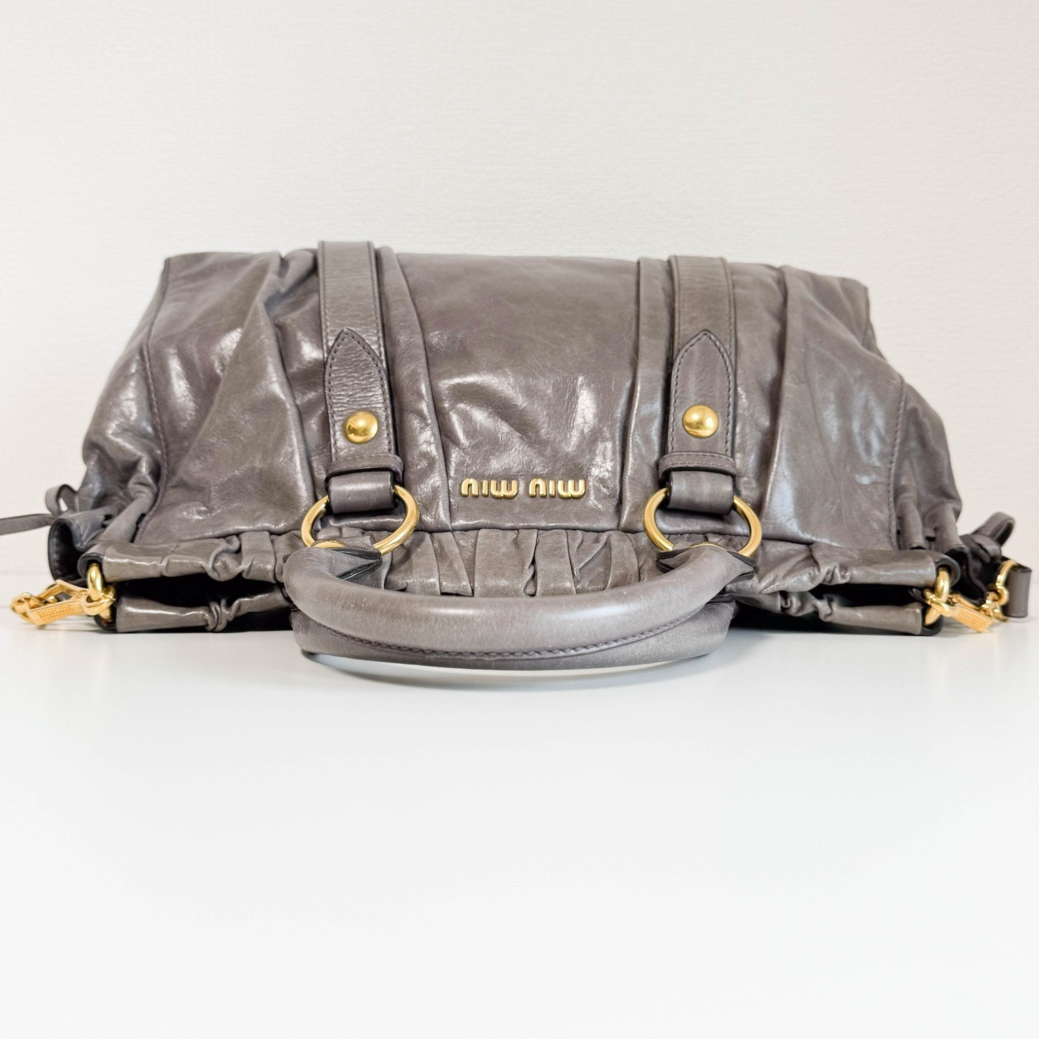MIU MIU Vitello Bauletto Leather Handbag Grey, in , Sold by HIVE PRELOVED - Crossbody bags, Handle Bags,