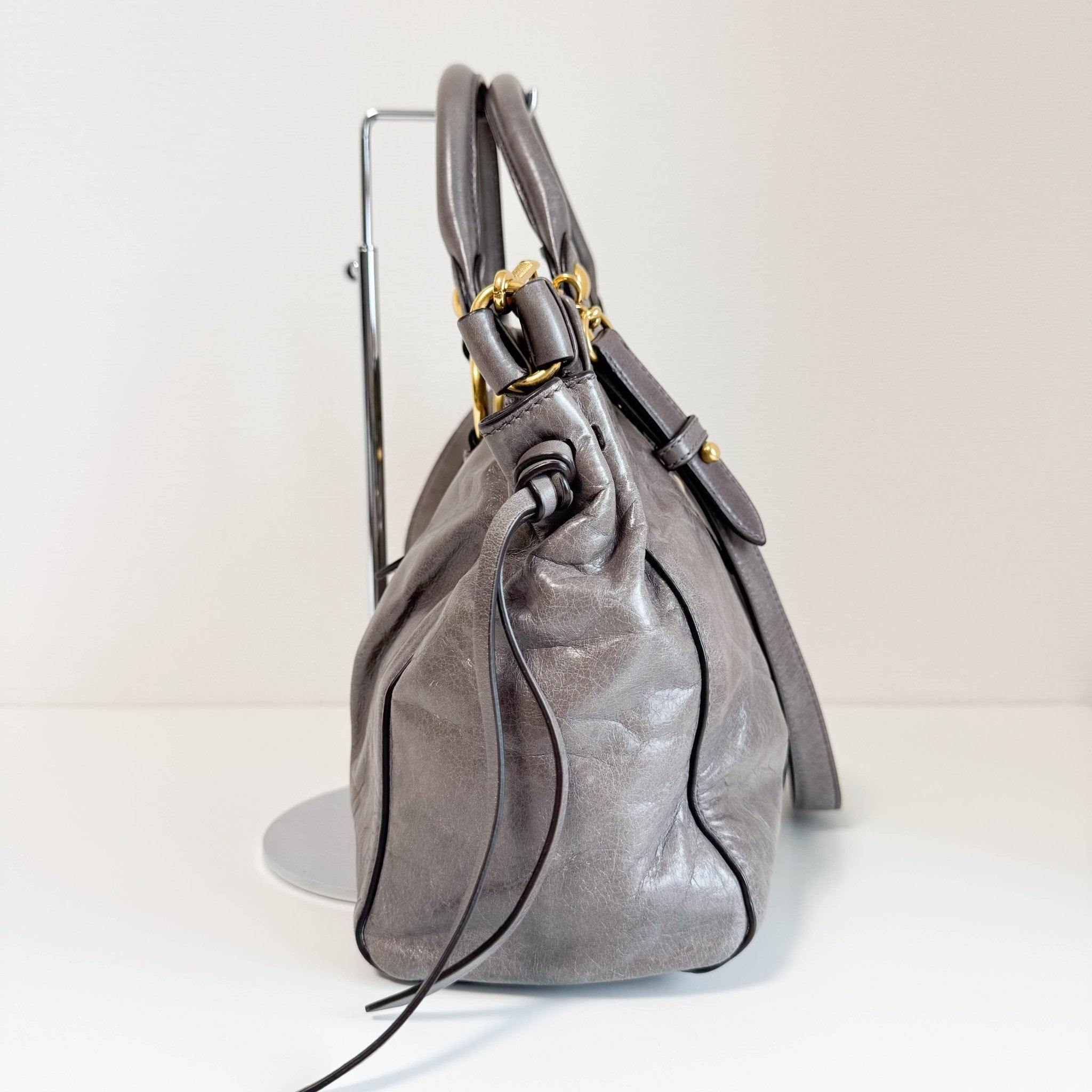 MIU MIU Vitello Bauletto Leather Handbag Grey, in , Sold by HIVE PRELOVED - Crossbody bags, Handle Bags,