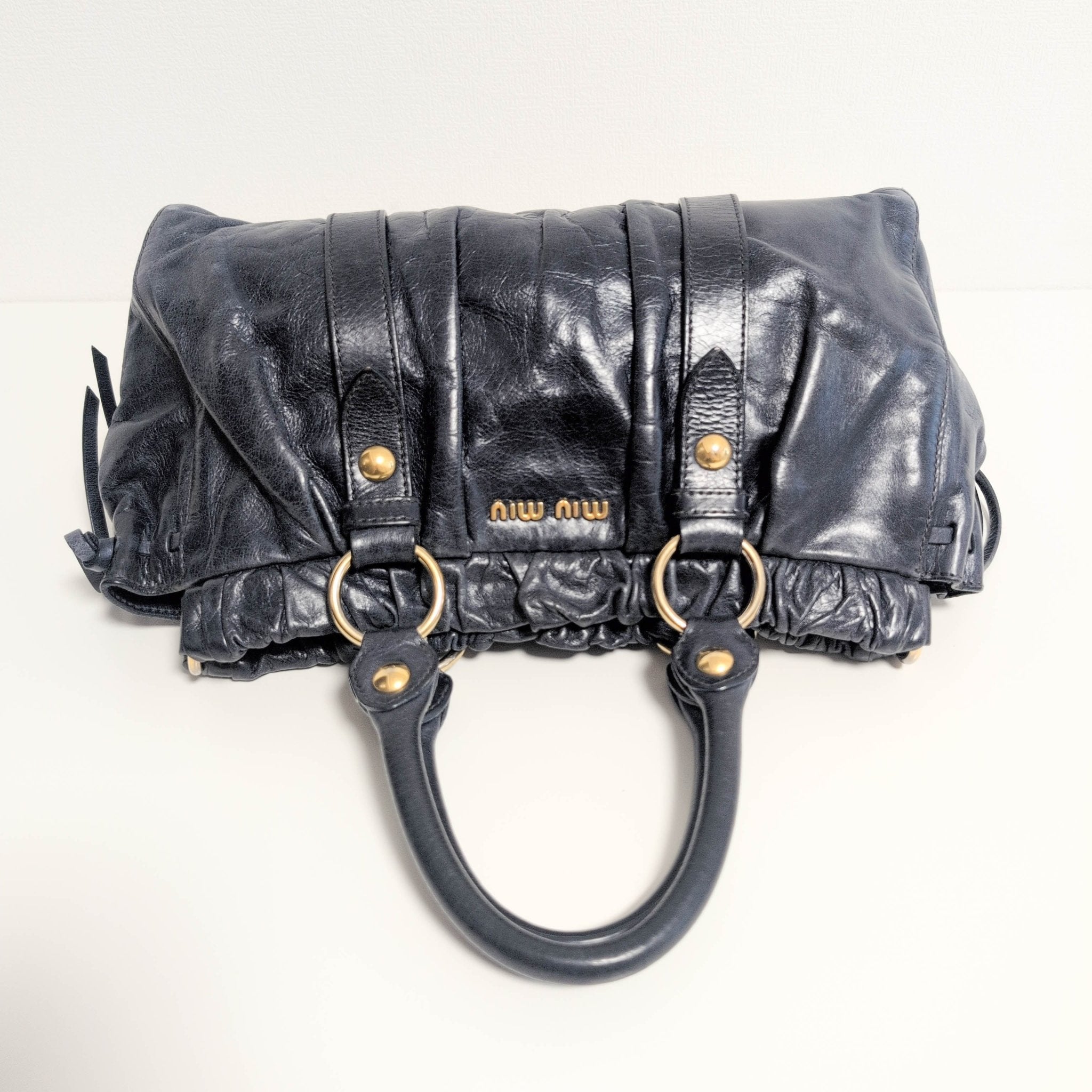 MIU MIU Vitello Bauletto Navy Leather Handbag, in , Sold by HIVE PRELOVED - Handle Bags, ,