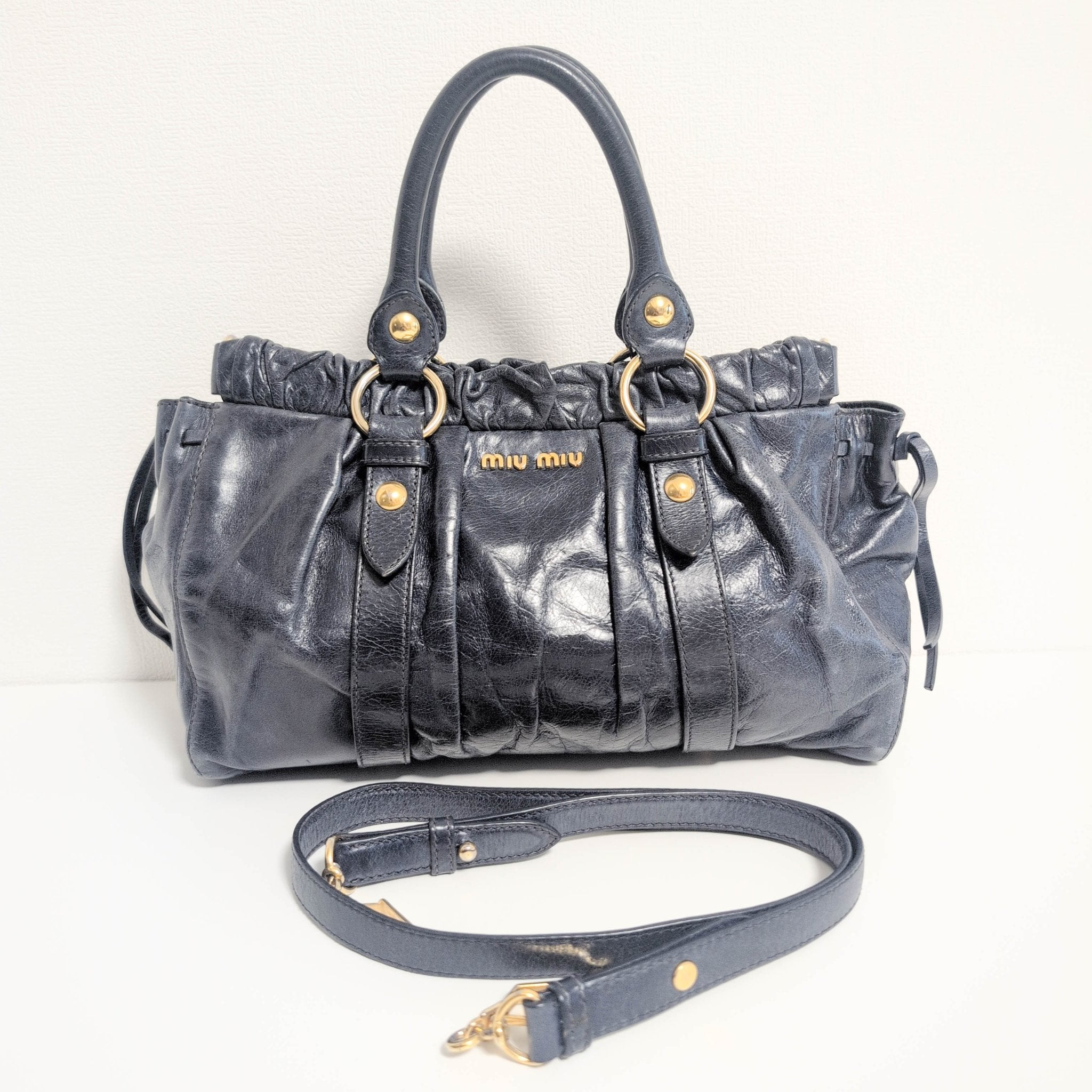 MIU MIU Vitello Bauletto Navy Leather Handbag, in , Sold by HIVE PRELOVED - Handle Bags, ,