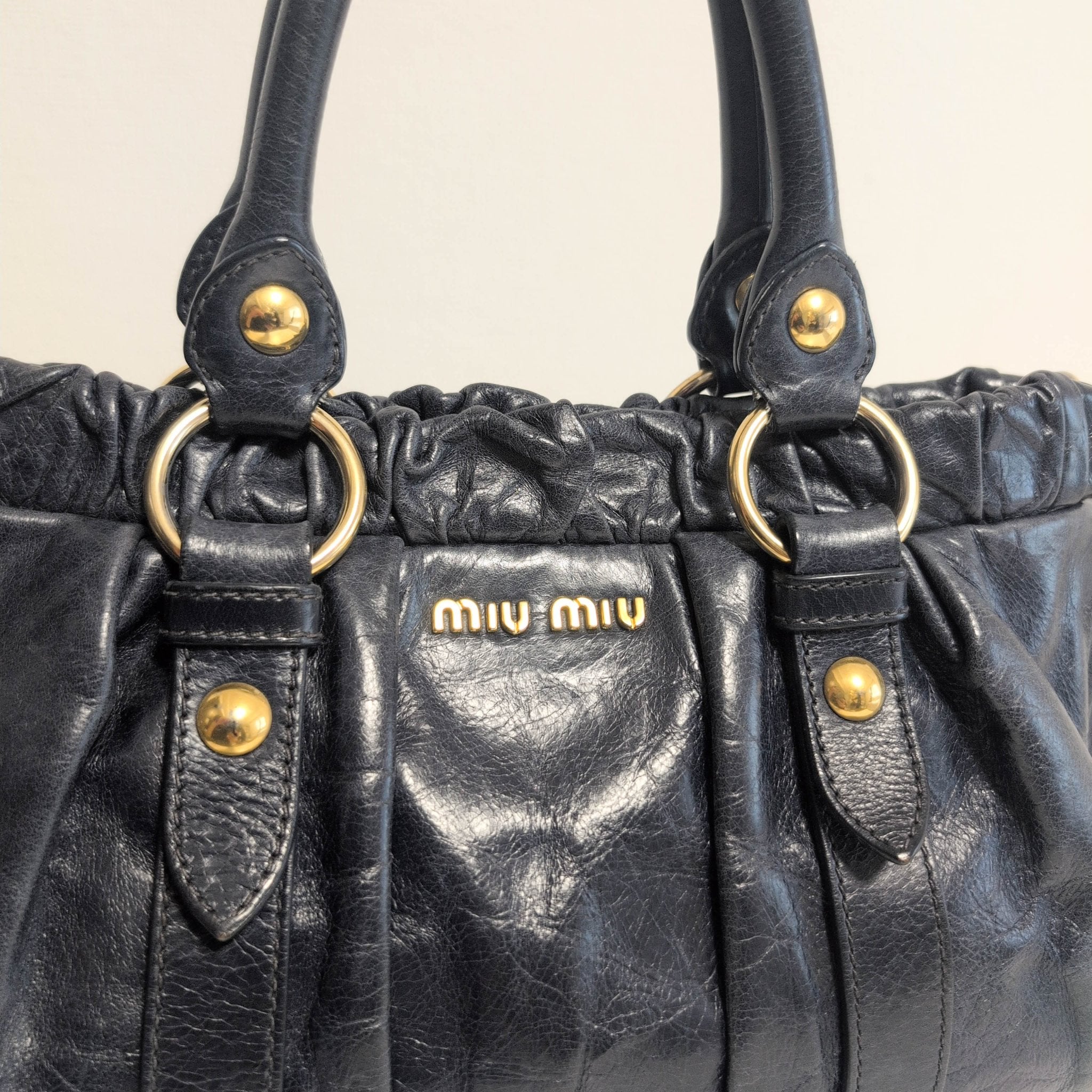 MIU MIU Vitello Bauletto Navy Leather Handbag, in , Sold by HIVE PRELOVED - Handle Bags, ,
