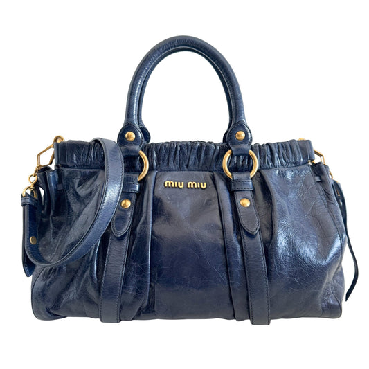 MIU MIU Vitello Bauletto Navy Leather Handbag, in , Sold by HIVE PRELOVED - Crossbody bags, Handle Bags,