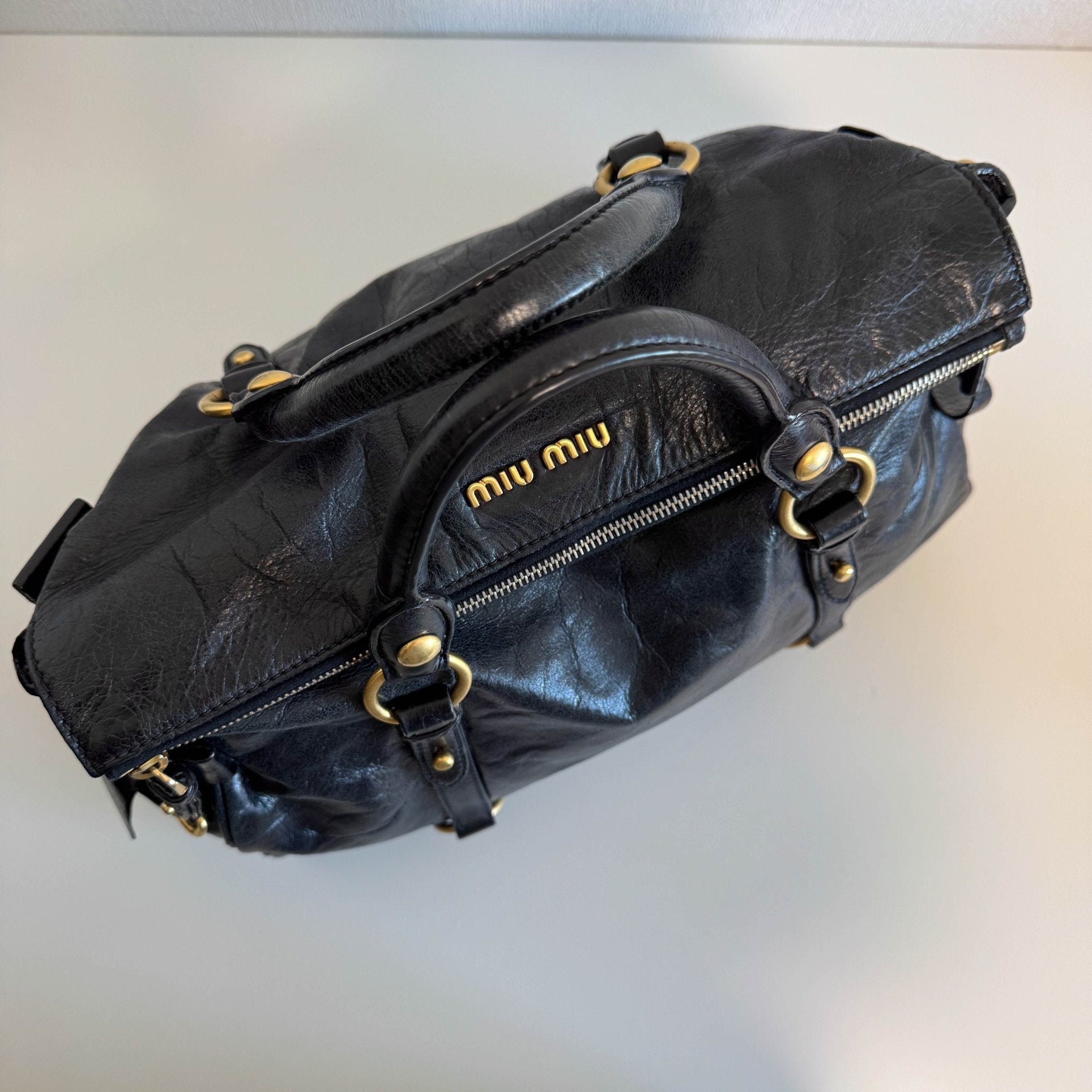 MIU MIU Vitello Black Leather Handle Bag with Crossbody Strap, in , Sold by HIVE PRELOVED - Crossbody bags, Handle Bags,
