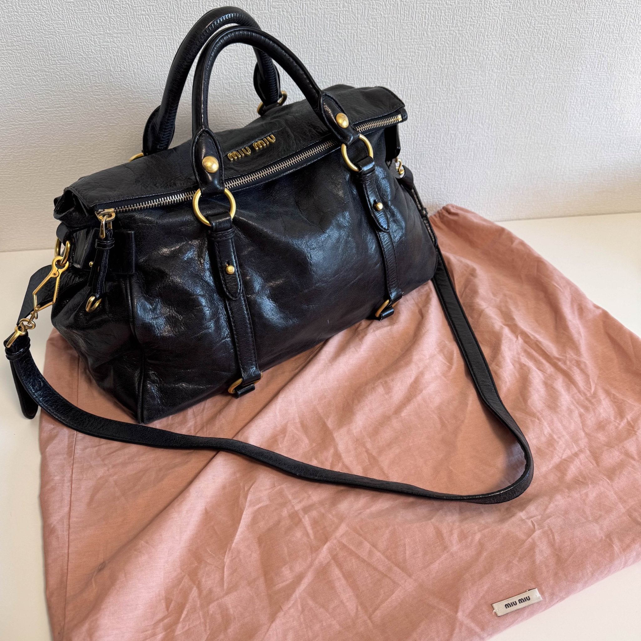 MIU MIU Vitello Black Leather Handle Bag with Crossbody Strap, in , Sold by HIVE PRELOVED - Crossbody bags, Handle Bags,