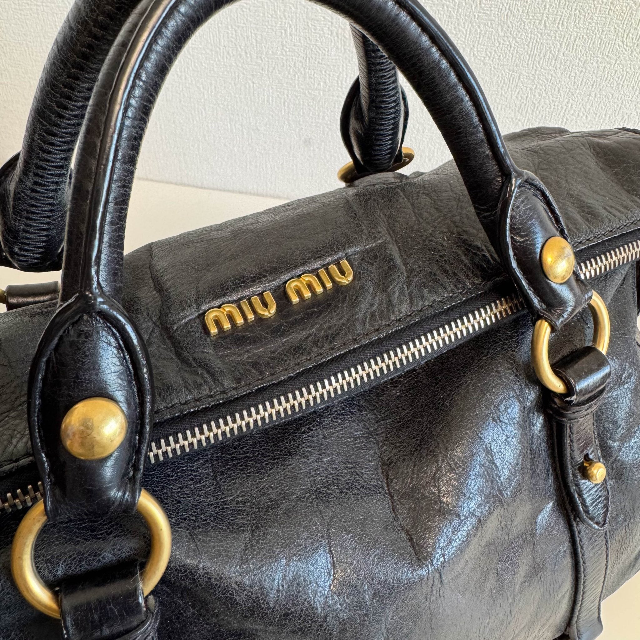 MIU MIU Vitello Black Leather Handle Bag with Crossbody Strap, in , Sold by HIVE PRELOVED - Crossbody bags, Handle Bags,