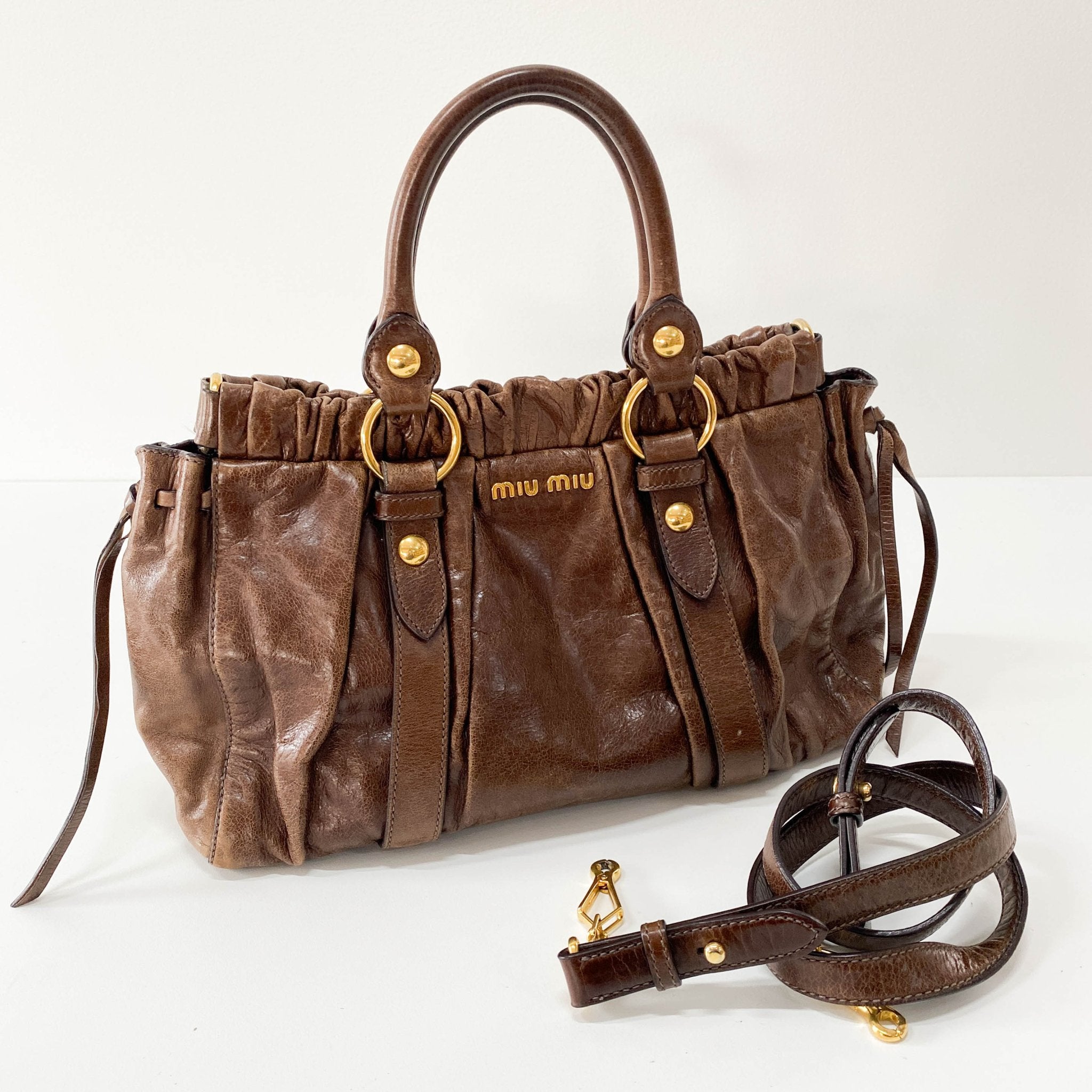 MIU MIU Vitello Brown Leather Top Handle Bag, in , Sold by HIVE PRELOVED - Crossbody bags, Handle Bags,
