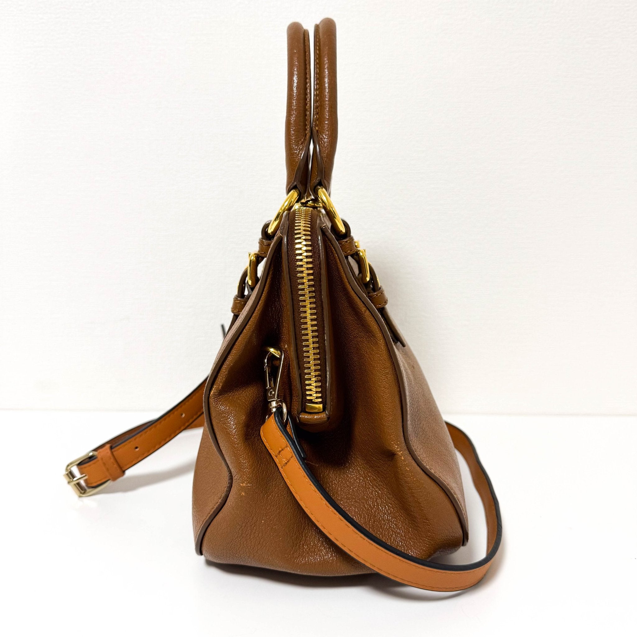 MIU MIU Vitello Caribu Brown Leather Top Handle Crossbody Bag, in , Sold by HIVE PRELOVED - Crossbody bags, Handle Bags,