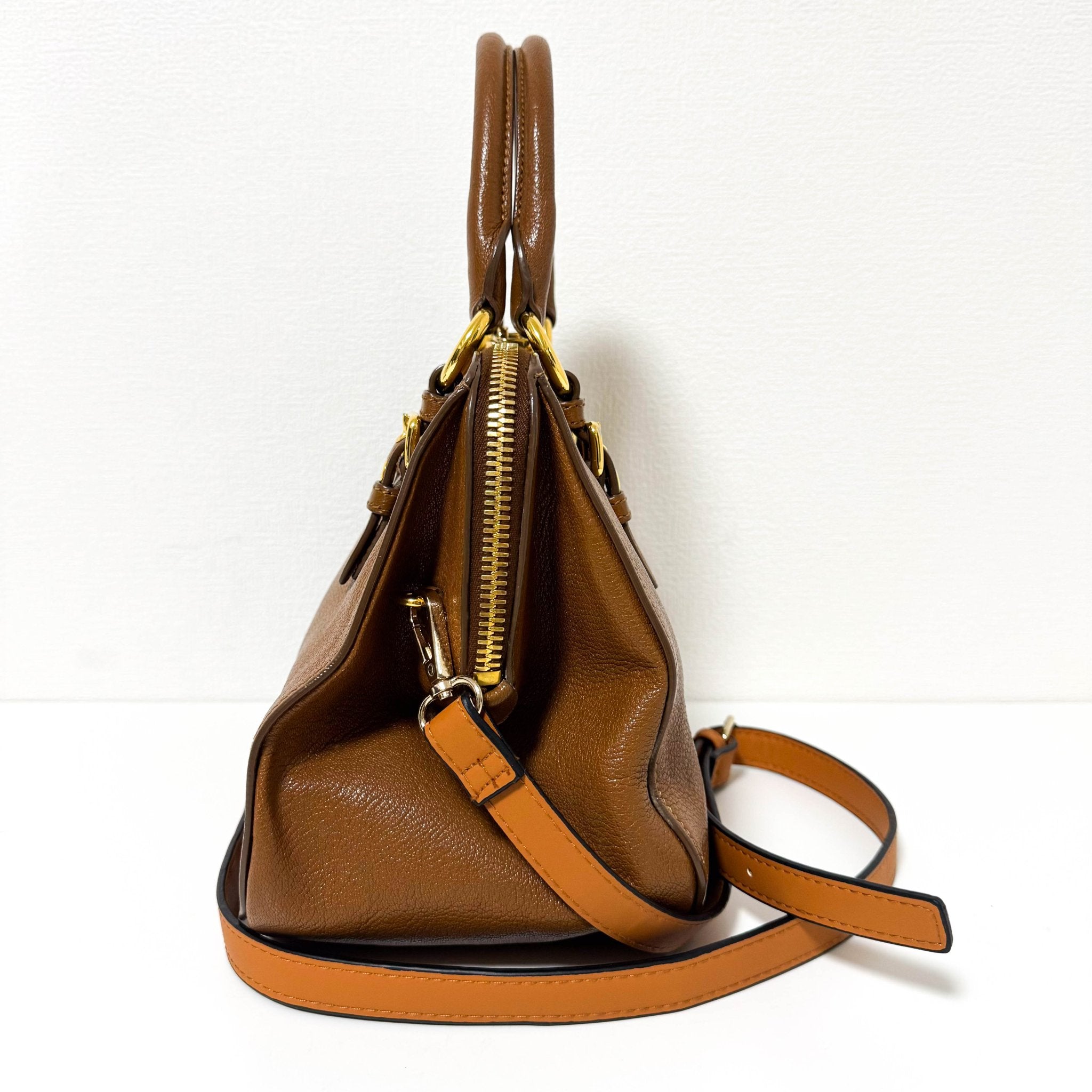 MIU MIU Vitello Caribu Brown Leather Top Handle Crossbody Bag, in , Sold by HIVE PRELOVED - Crossbody bags, Handle Bags,