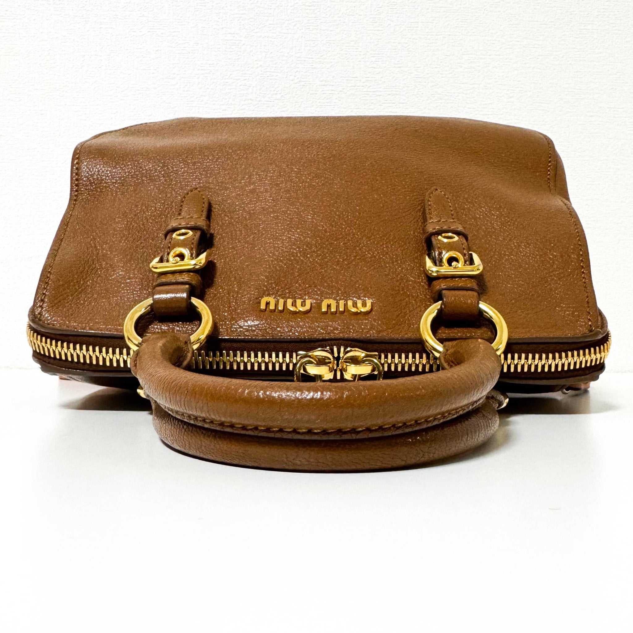 MIU MIU Vitello Caribu Brown Leather Top Handle Crossbody Bag, in , Sold by HIVE PRELOVED - Crossbody bags, Handle Bags,