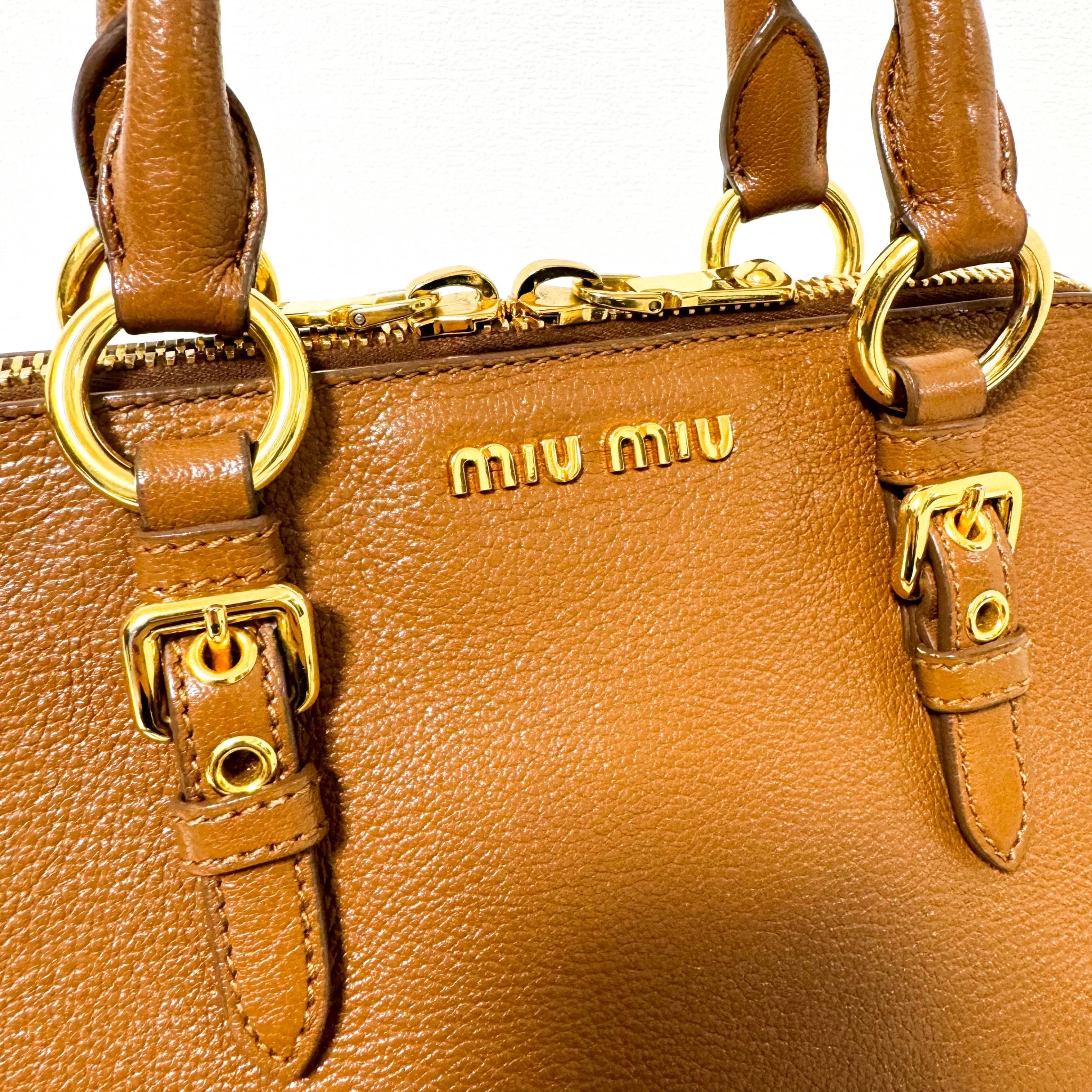 MIU MIU Vitello Caribu Brown Leather Top Handle Crossbody Bag, in , Sold by HIVE PRELOVED - Crossbody bags, Handle Bags,